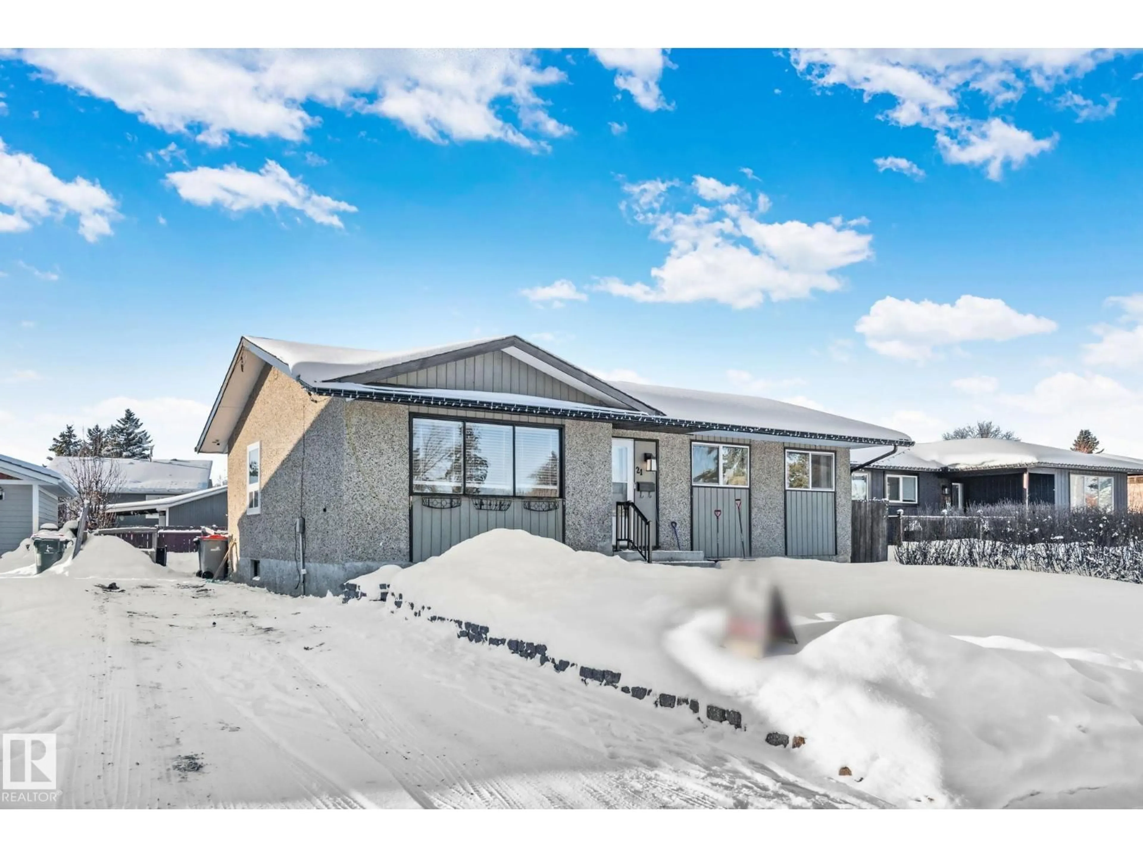 A pic from outside/outdoor area/front of a property/back of a property/a pic from drone, building for 21 LUNDY PARK RD, Stony Plain Alberta T7Z1G2