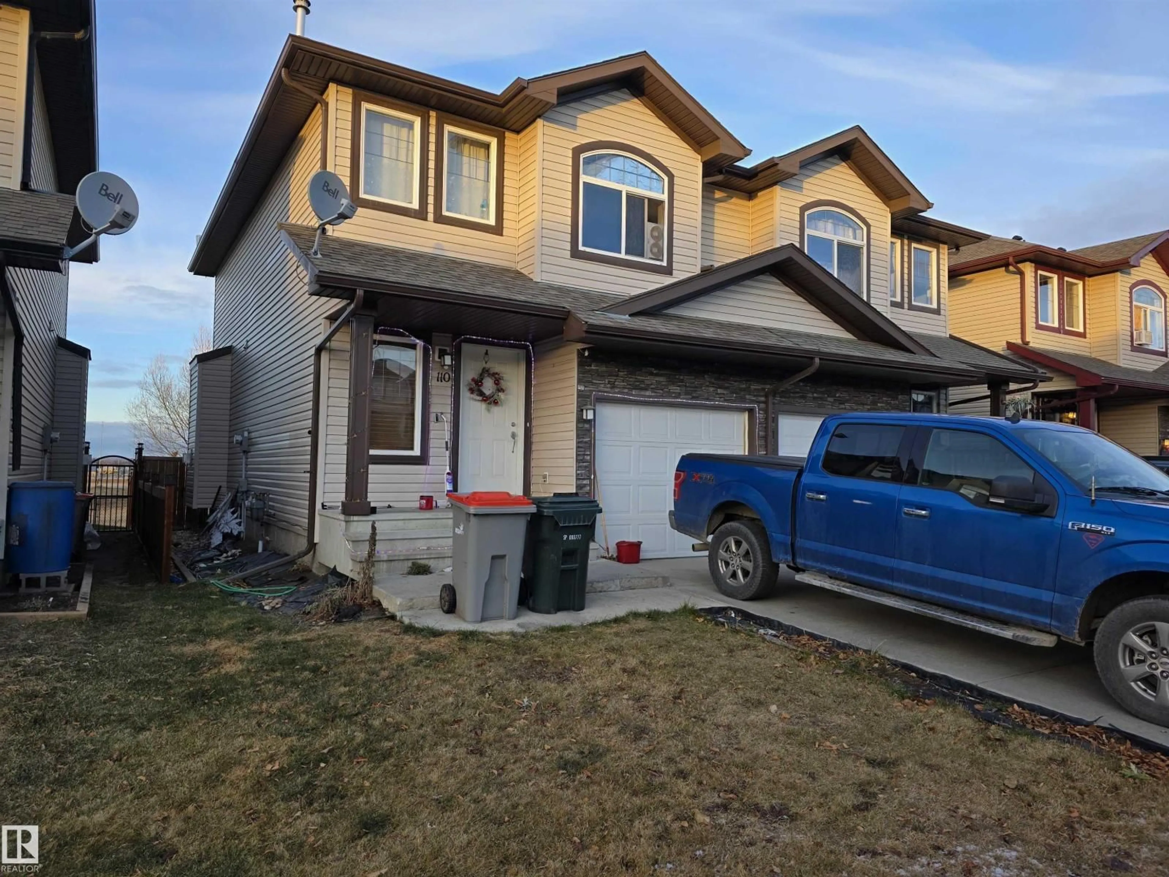 Home with vinyl exterior material, street for 110 MERIDIAN LO, Stony Plain Alberta T7Z0B7