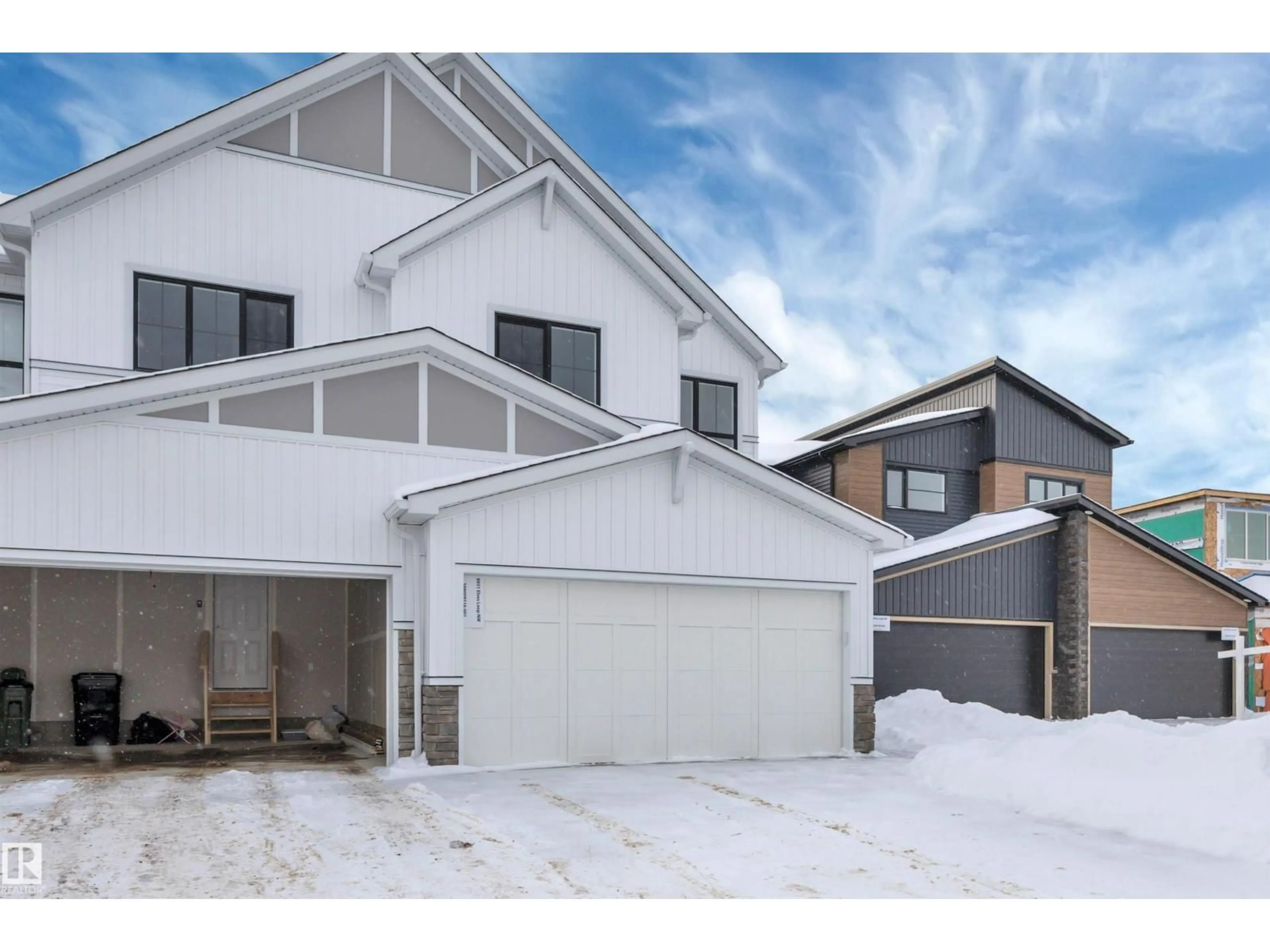 A pic from outside/outdoor area/front of a property/back of a property/a pic from drone, street for 8931 ELVES LO, Edmonton Alberta T6M3G3