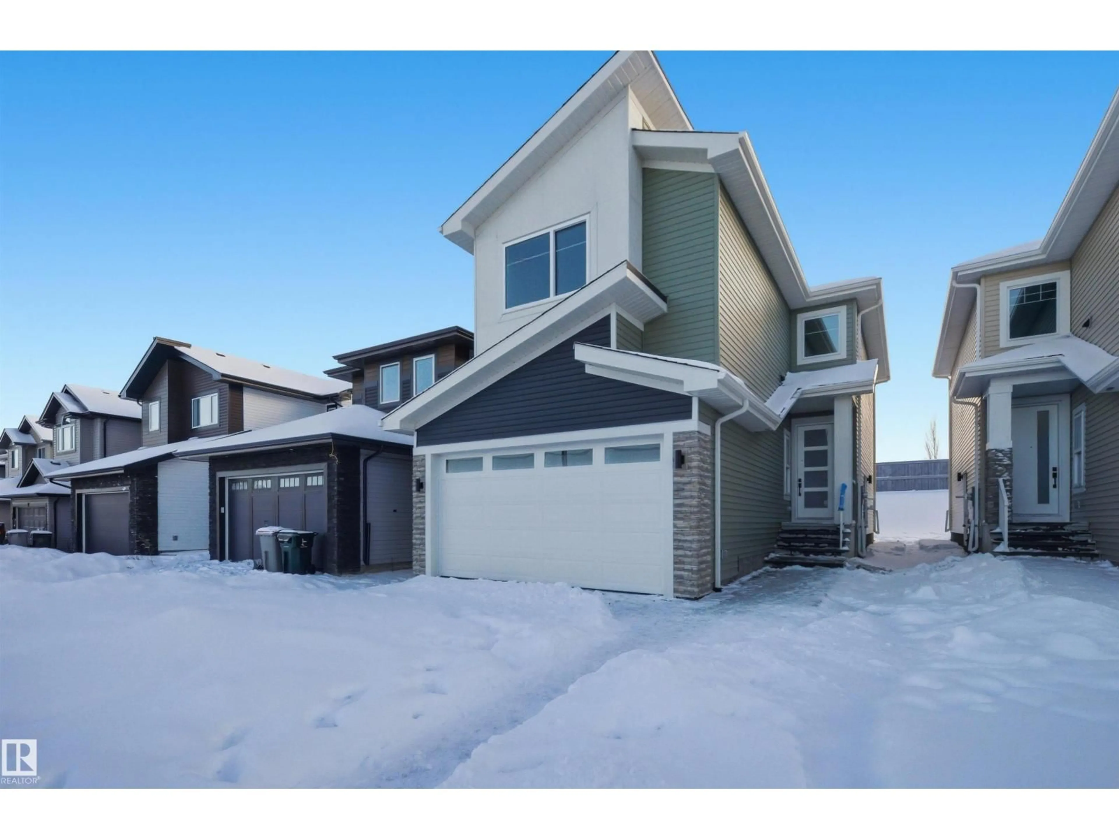 Home with vinyl exterior material, street for 63 SILVERSTONE DR, Stony Plain Alberta T7Y0E8