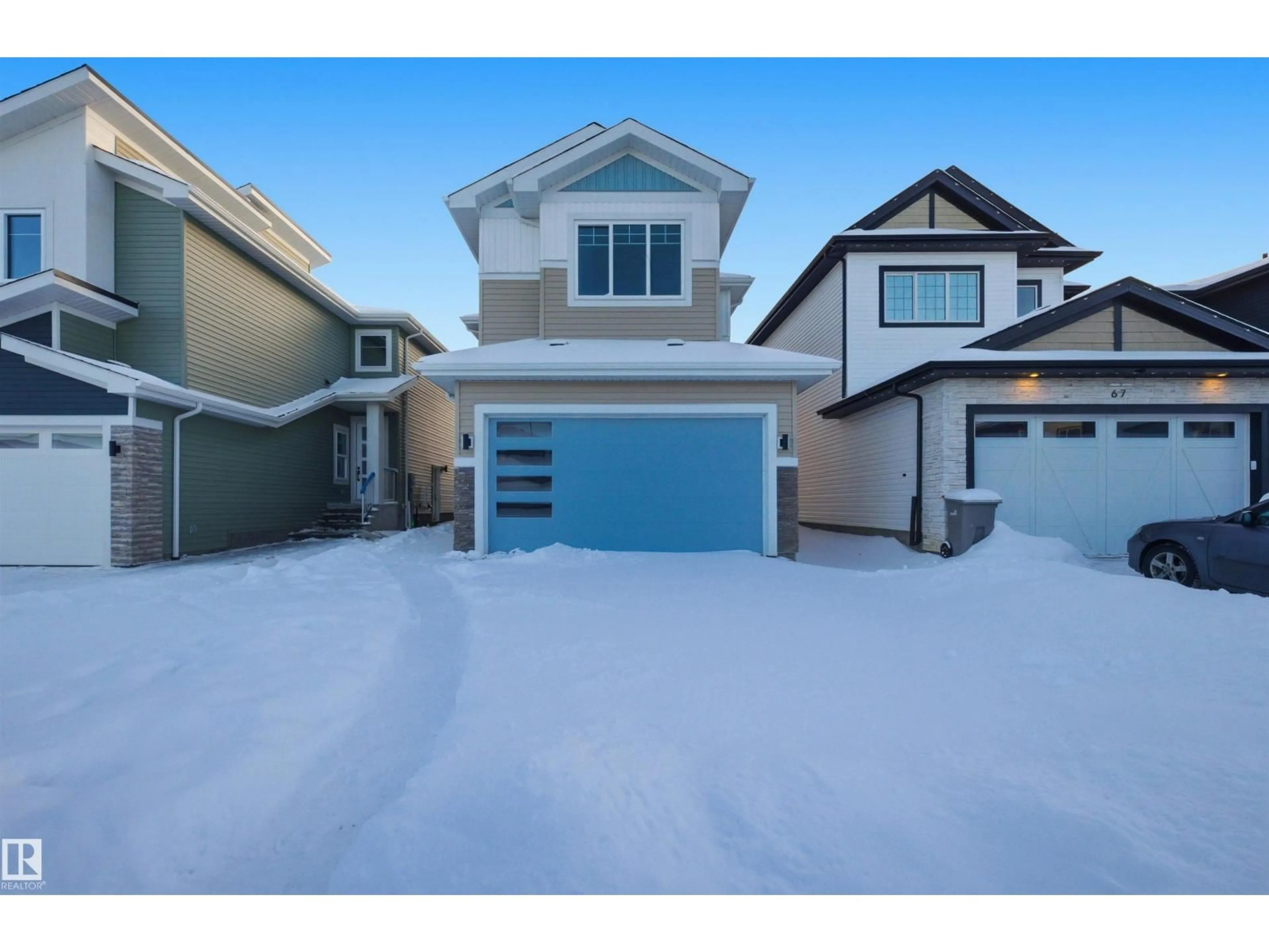 Home with vinyl exterior material, street for 65 SILVERSTONE DR, Stony Plain Alberta T7Z0E8