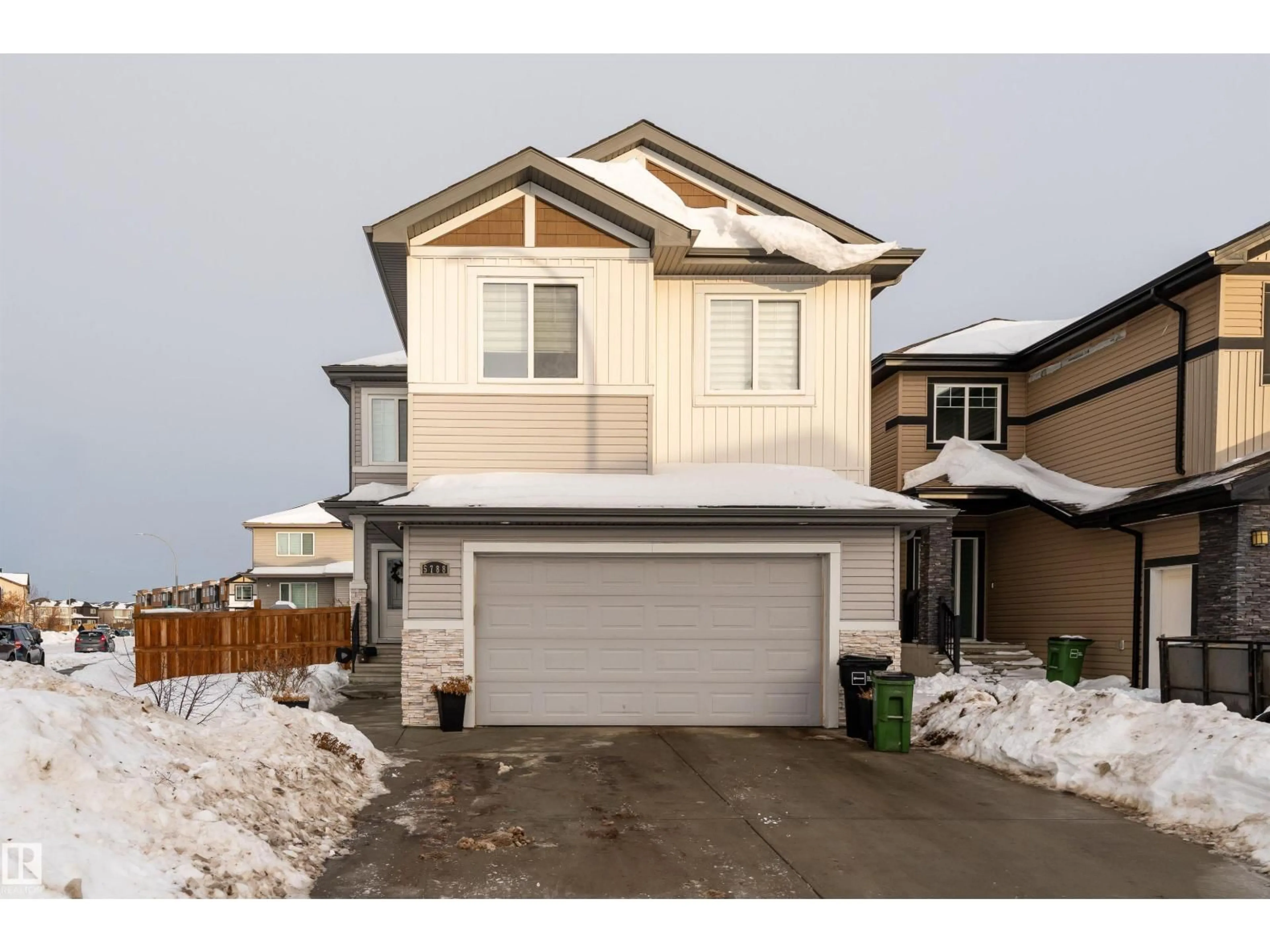 Home with vinyl exterior material, street for NW - 5788 175B AV, Edmonton Alberta T5Y0V2