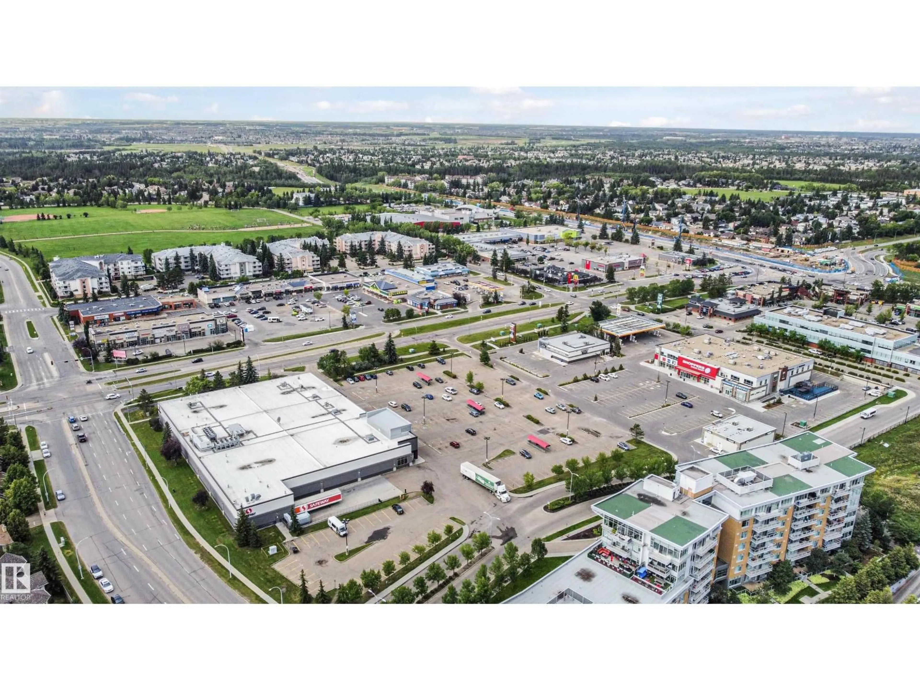 A pic from outside/outdoor area/front of a property/back of a property/a pic from drone, street for #408 - 2755 109 ST, Edmonton Alberta T6J5S4