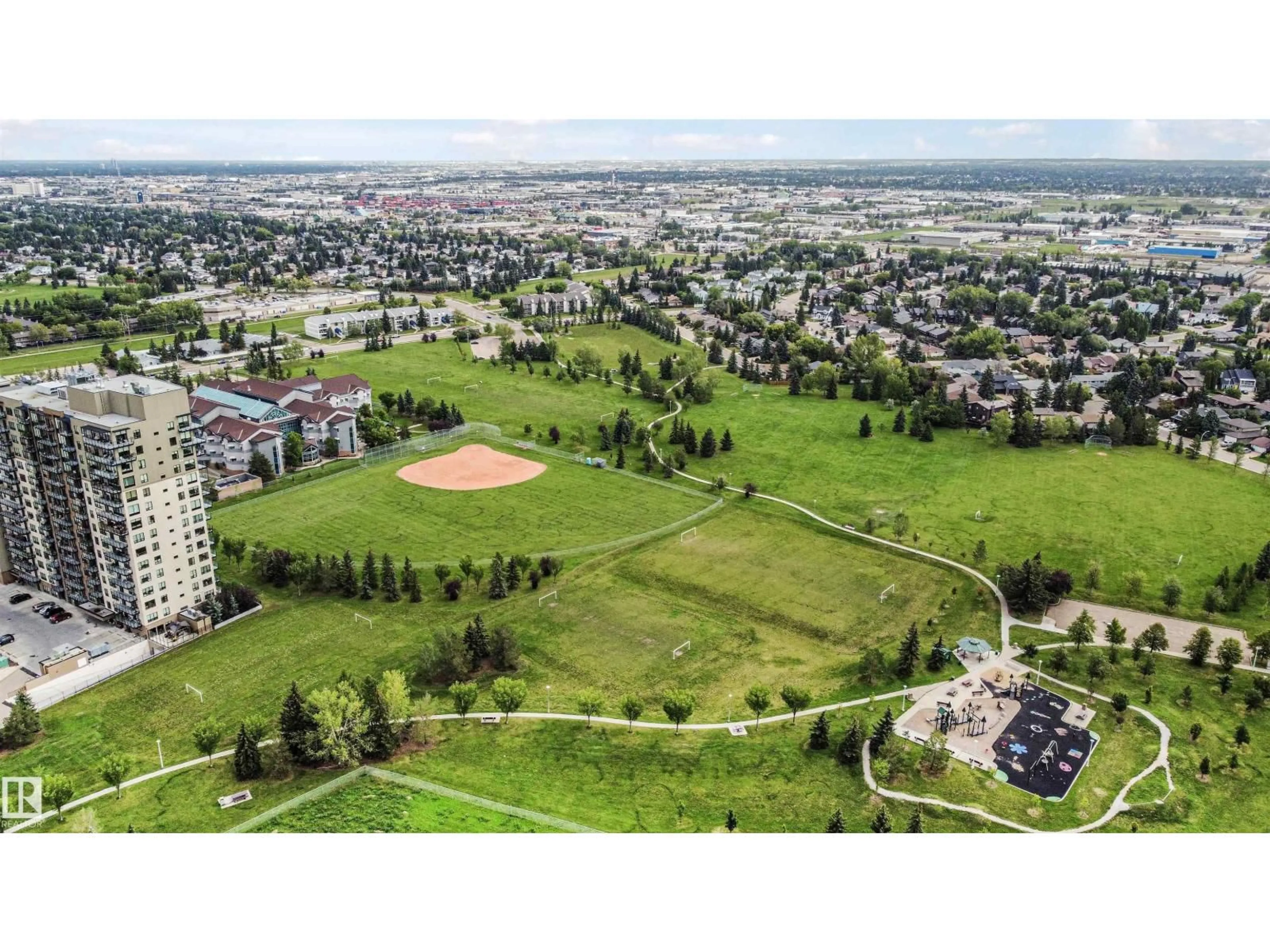 A pic from outside/outdoor area/front of a property/back of a property/a pic from drone, mountain view for #408 - 2755 109 ST, Edmonton Alberta T6J5S4