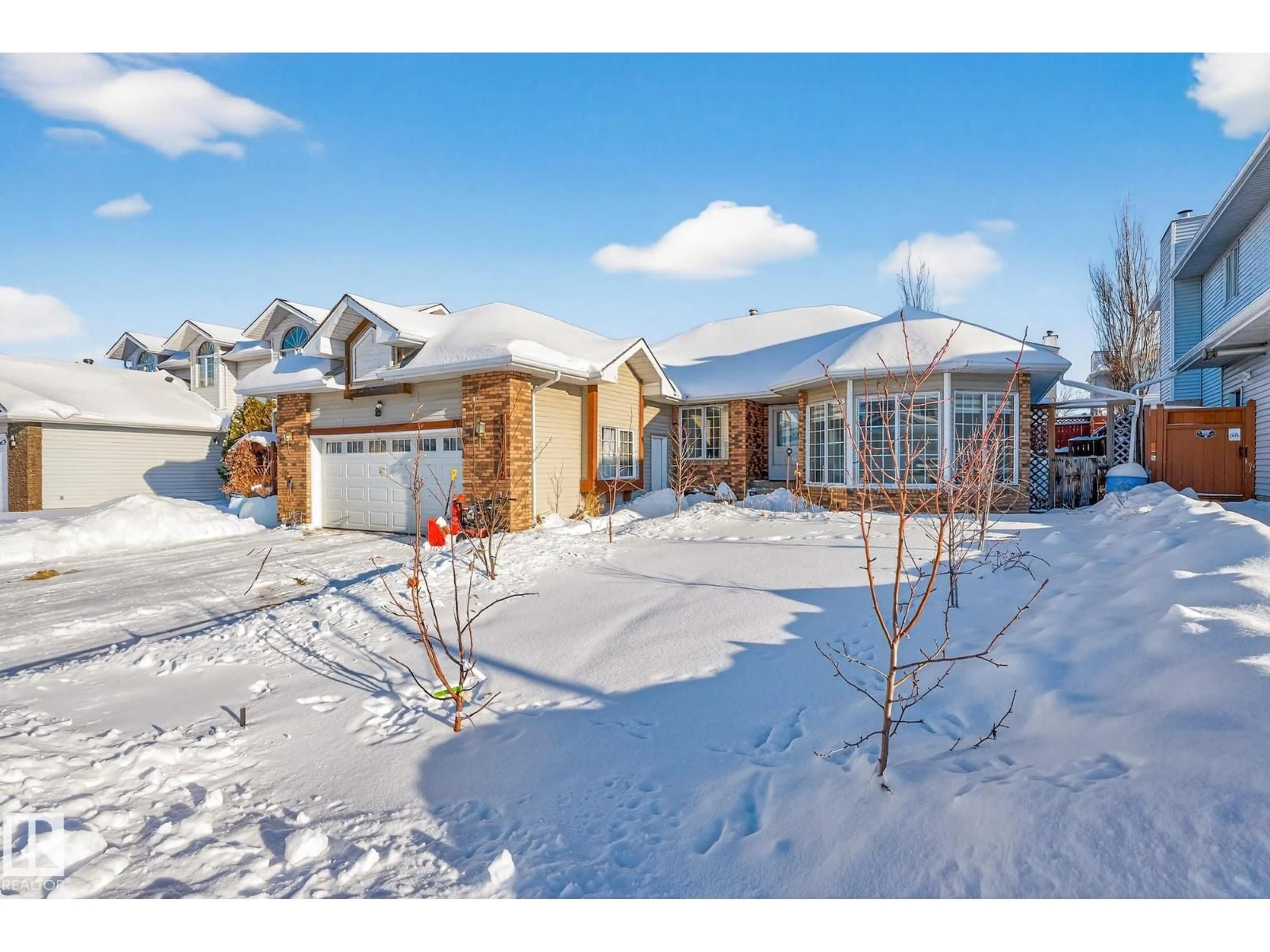 Home with brick exterior material, street for 15411 67A NW, Edmonton Alberta T5Z2W8