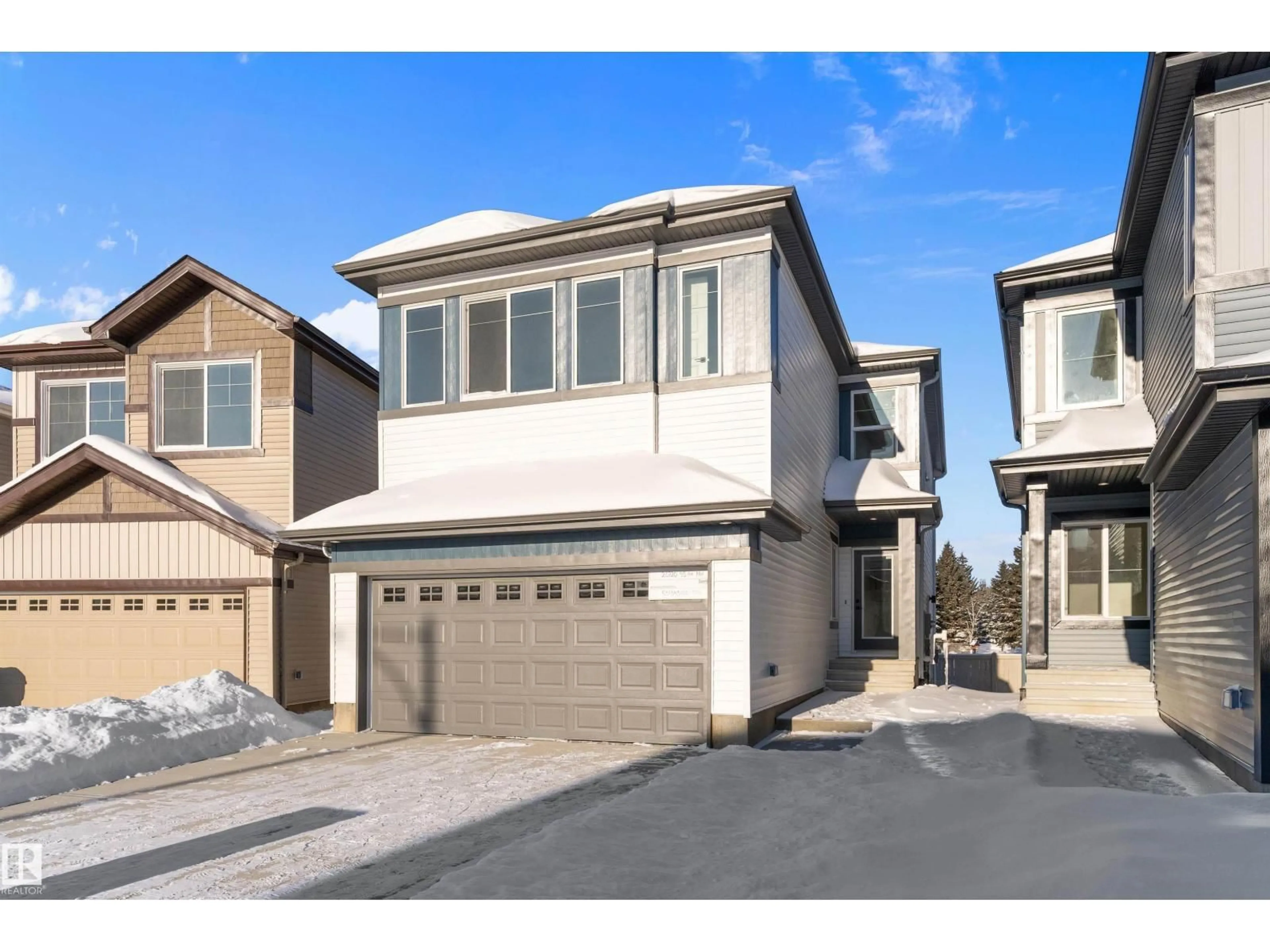 Home with vinyl exterior material, street for 20720 43 AV, Edmonton Alberta T6M3E9