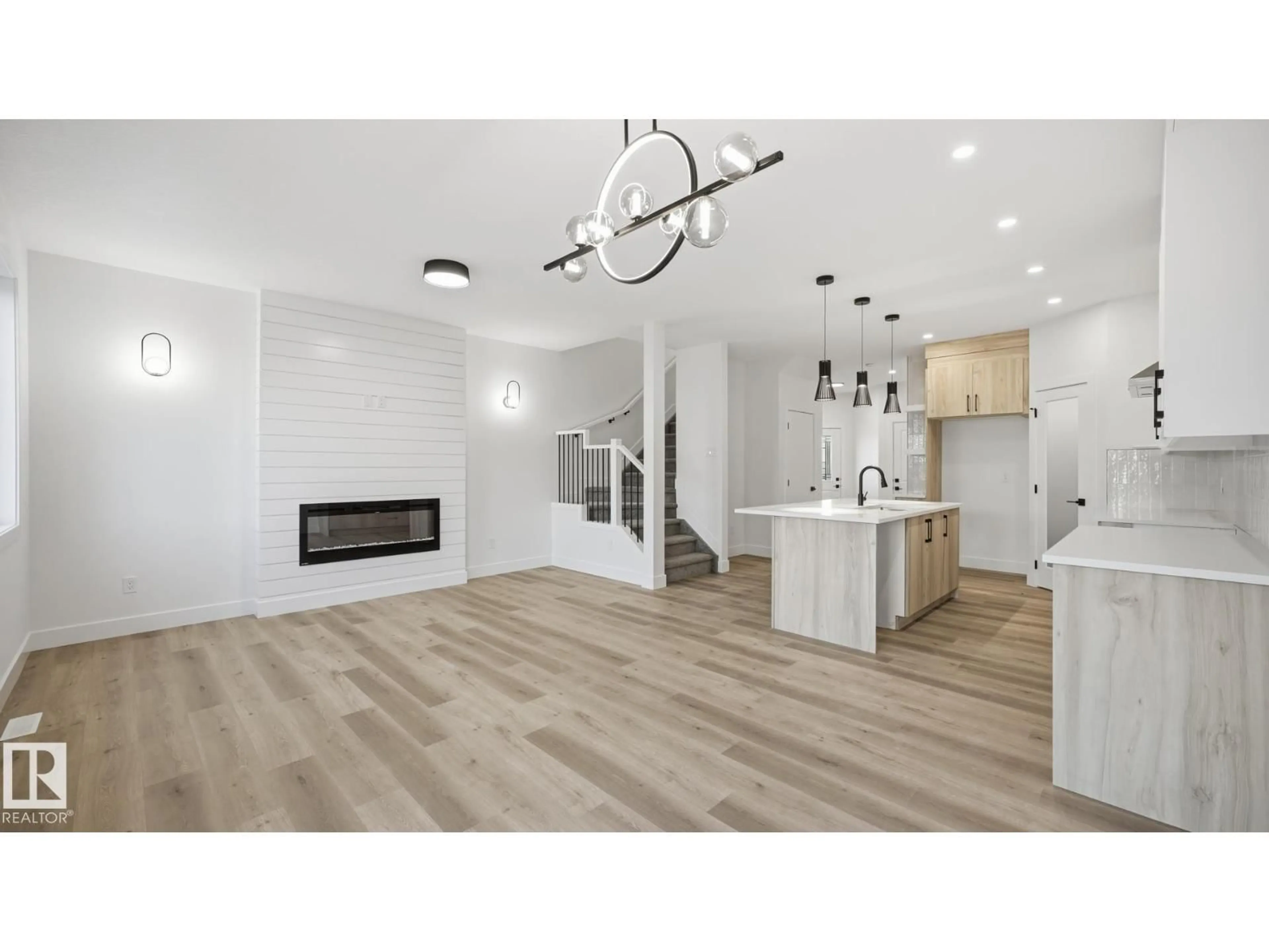Open concept kitchen, wood/laminate floor for 108 SPRING LI, Spruce Grove Alberta T7X2X7