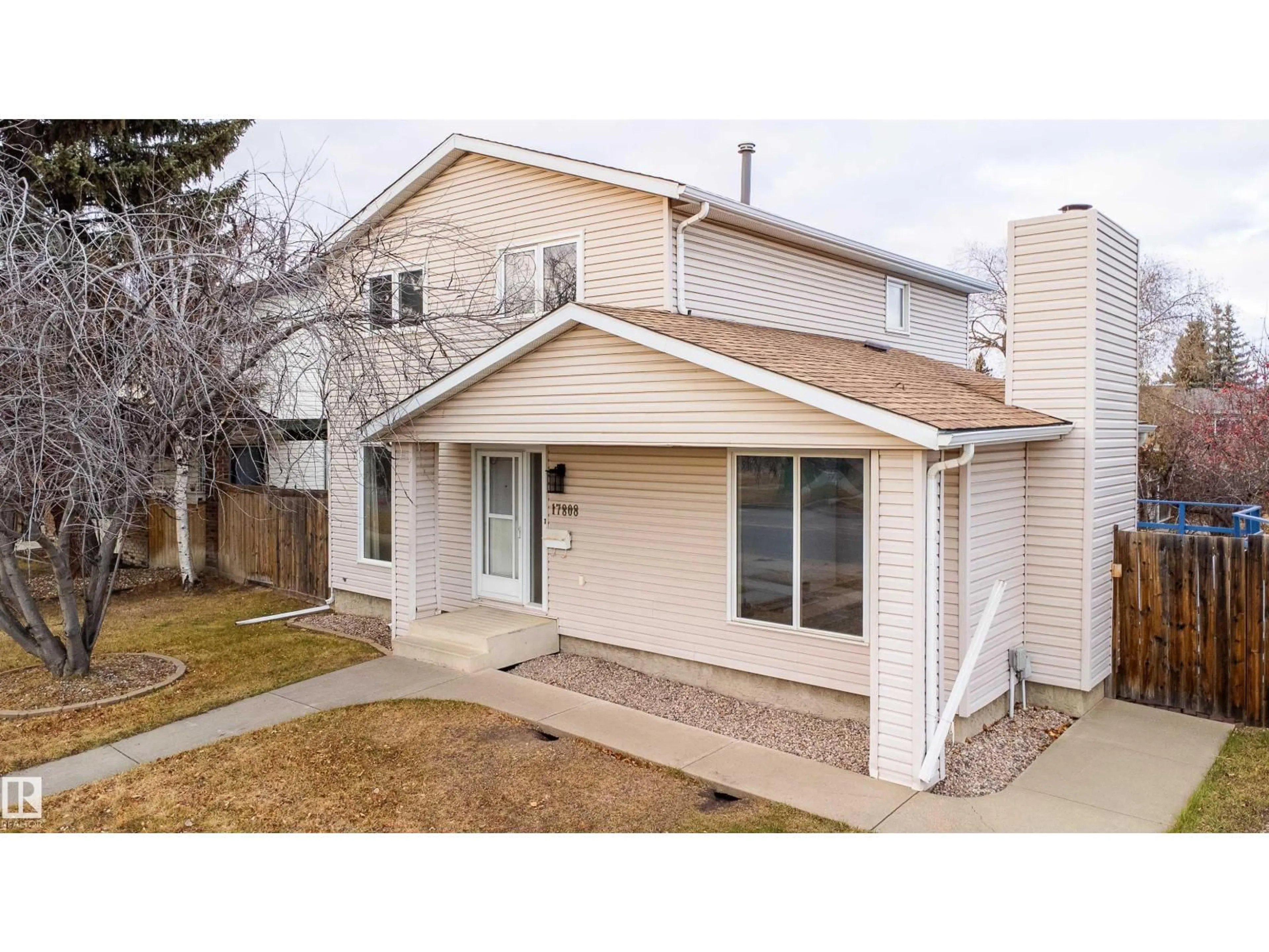 Home with vinyl exterior material, street for 17808 76 AV, Edmonton Alberta T5T2G1