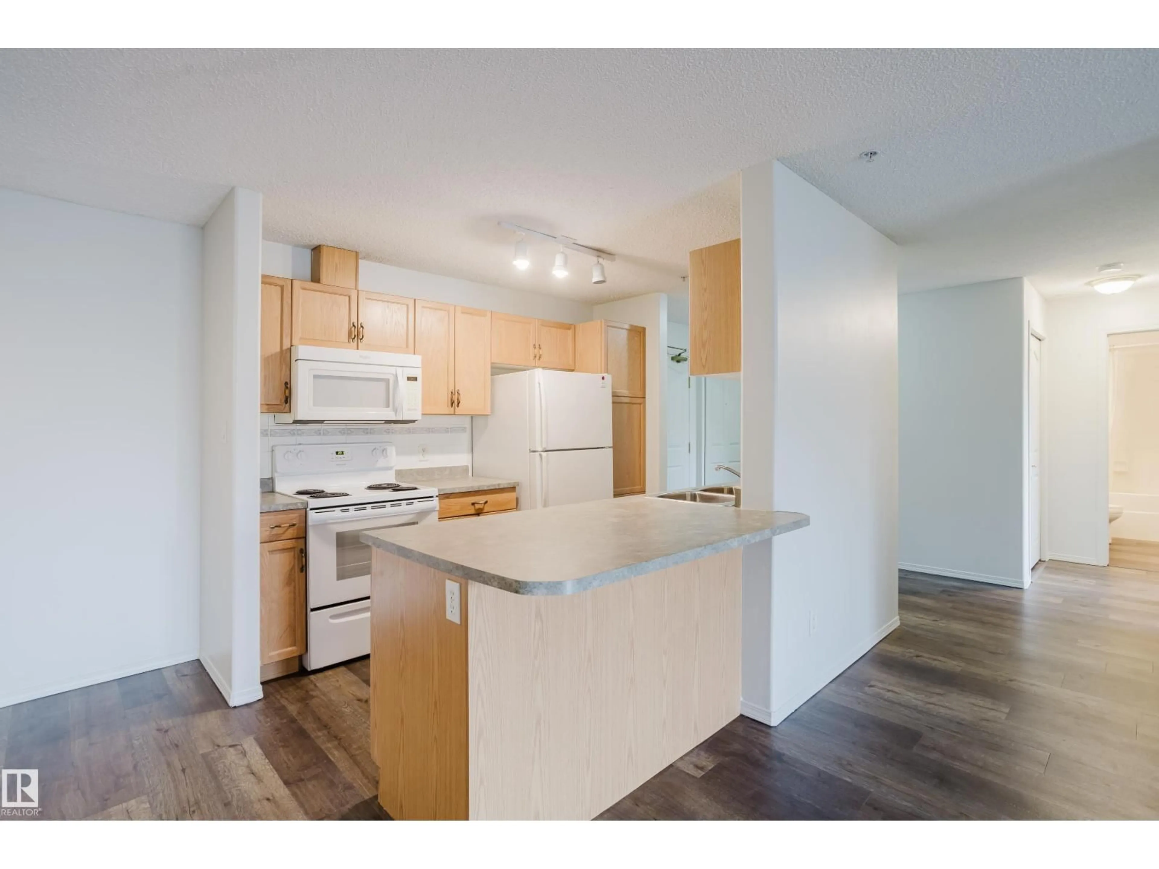 Standard kitchen, wood/laminate floor for #324 - 2903 RABBIT HILL RD, Edmonton Alberta T6R3A3