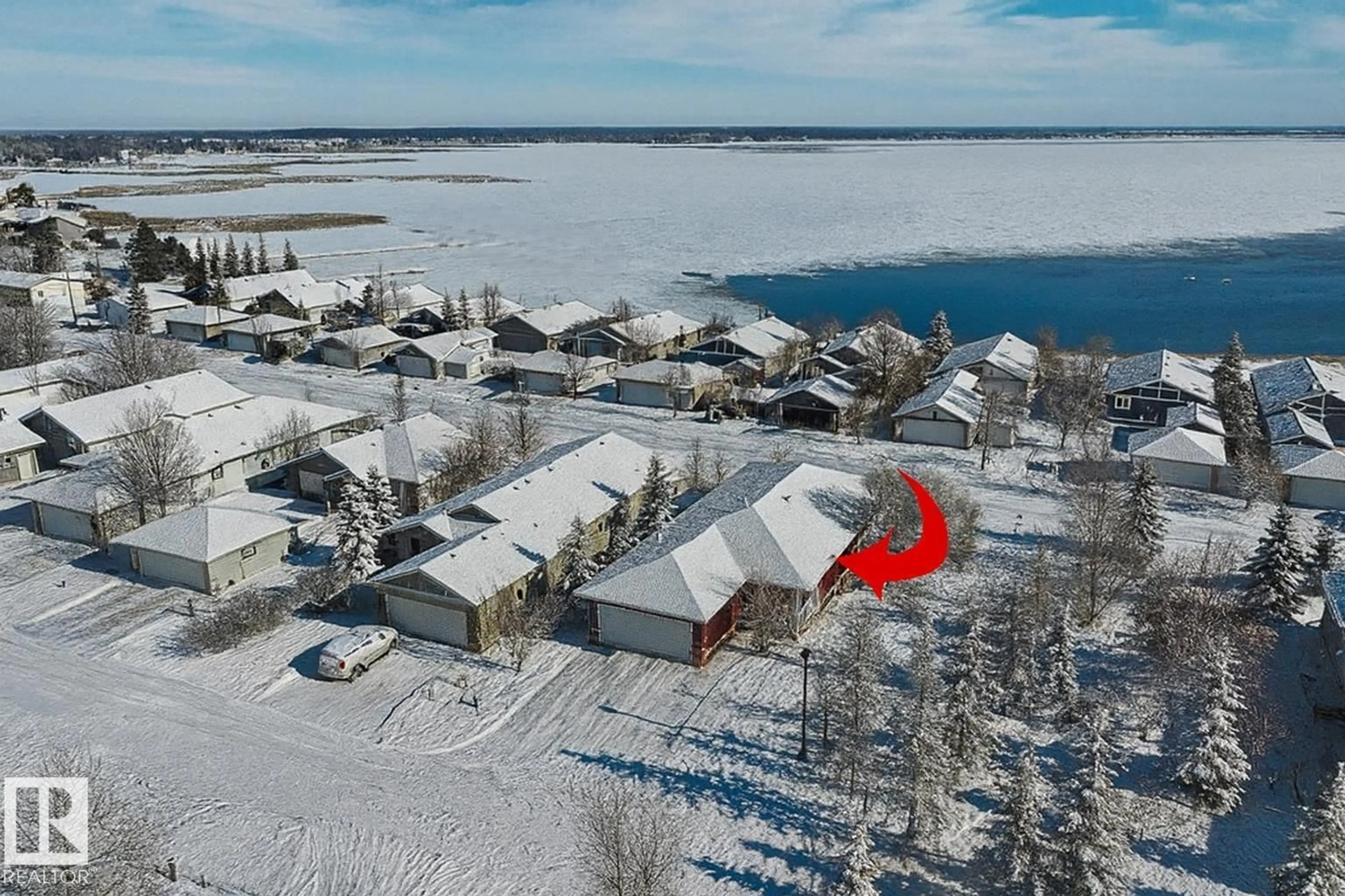 A pic from outside/outdoor area/front of a property/back of a property/a pic from drone, water/lake/river/ocean view for 327 55101 STE. ANNE TR, Rural Lac Ste. Anne County Alberta T0E1A0