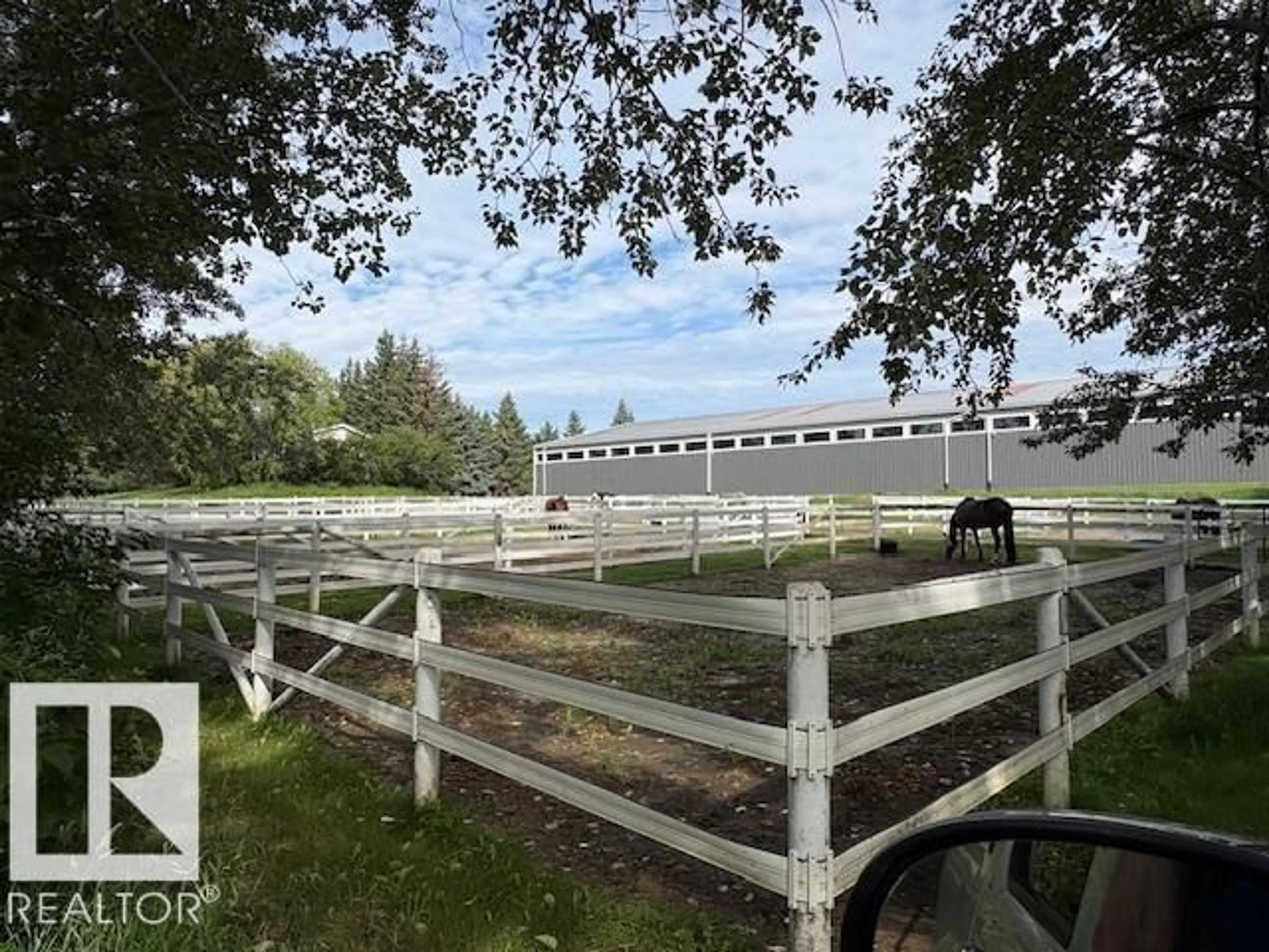 A pic from outside/outdoor area/front of a property/back of a property/a pic from drone, unknown for 26113 TWP RD 514, Rural Parkland County Alberta T7Y1B5