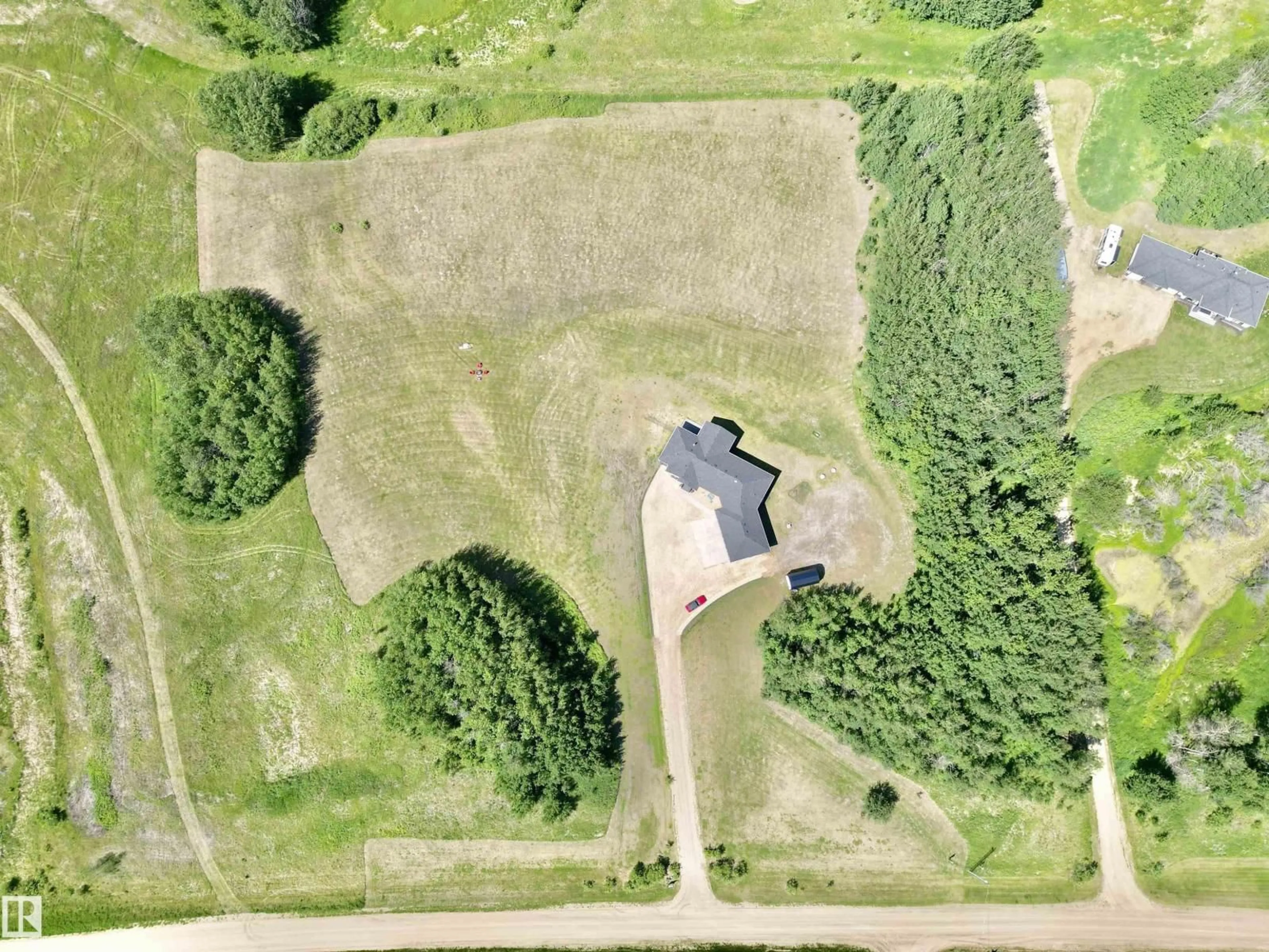 A pic from outside/outdoor area/front of a property/back of a property/a pic from drone, building for 197 - 50072 RANGE ROAD 205, Rural Camrose County Alberta T0B2M1