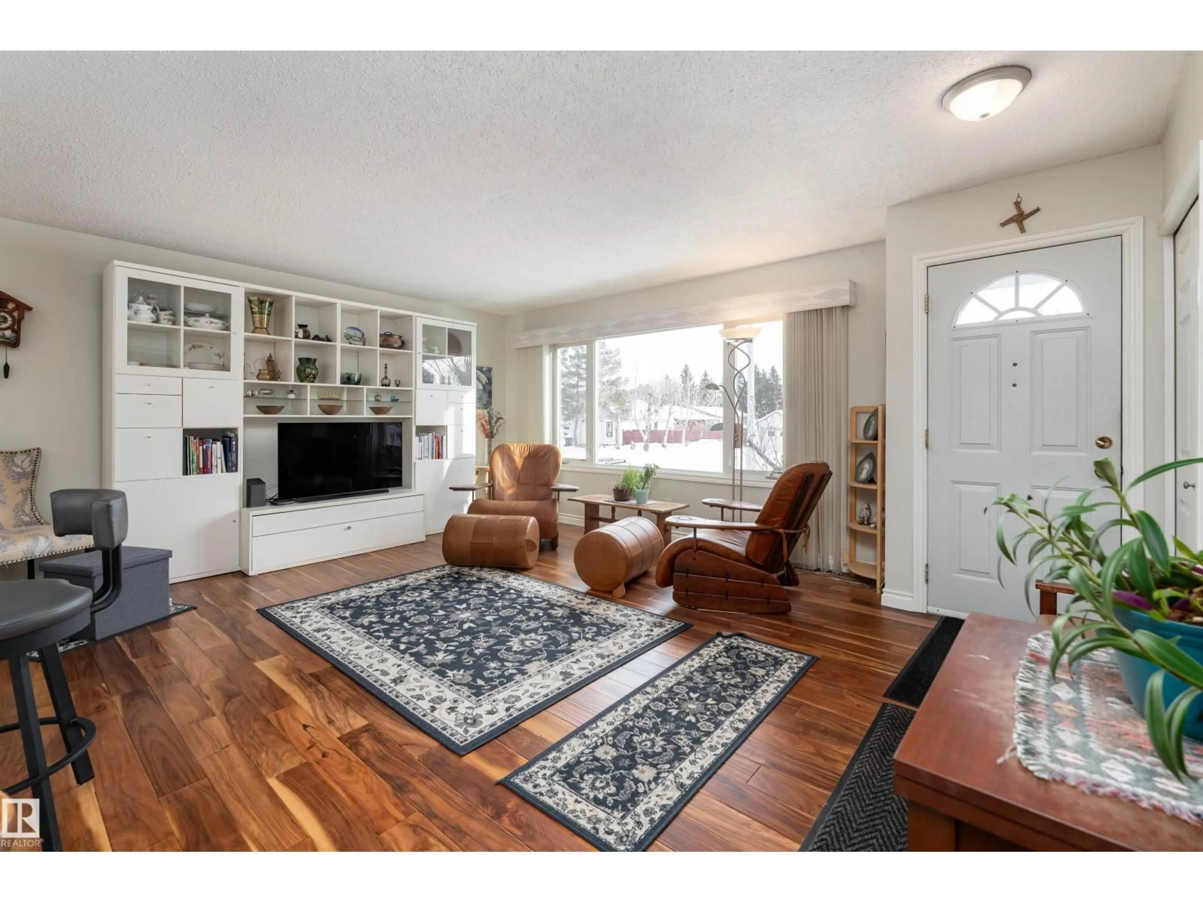 Living room with furniture, wood/laminate floor for 5114 51 ST, Bruderheim Alberta T0B0S0