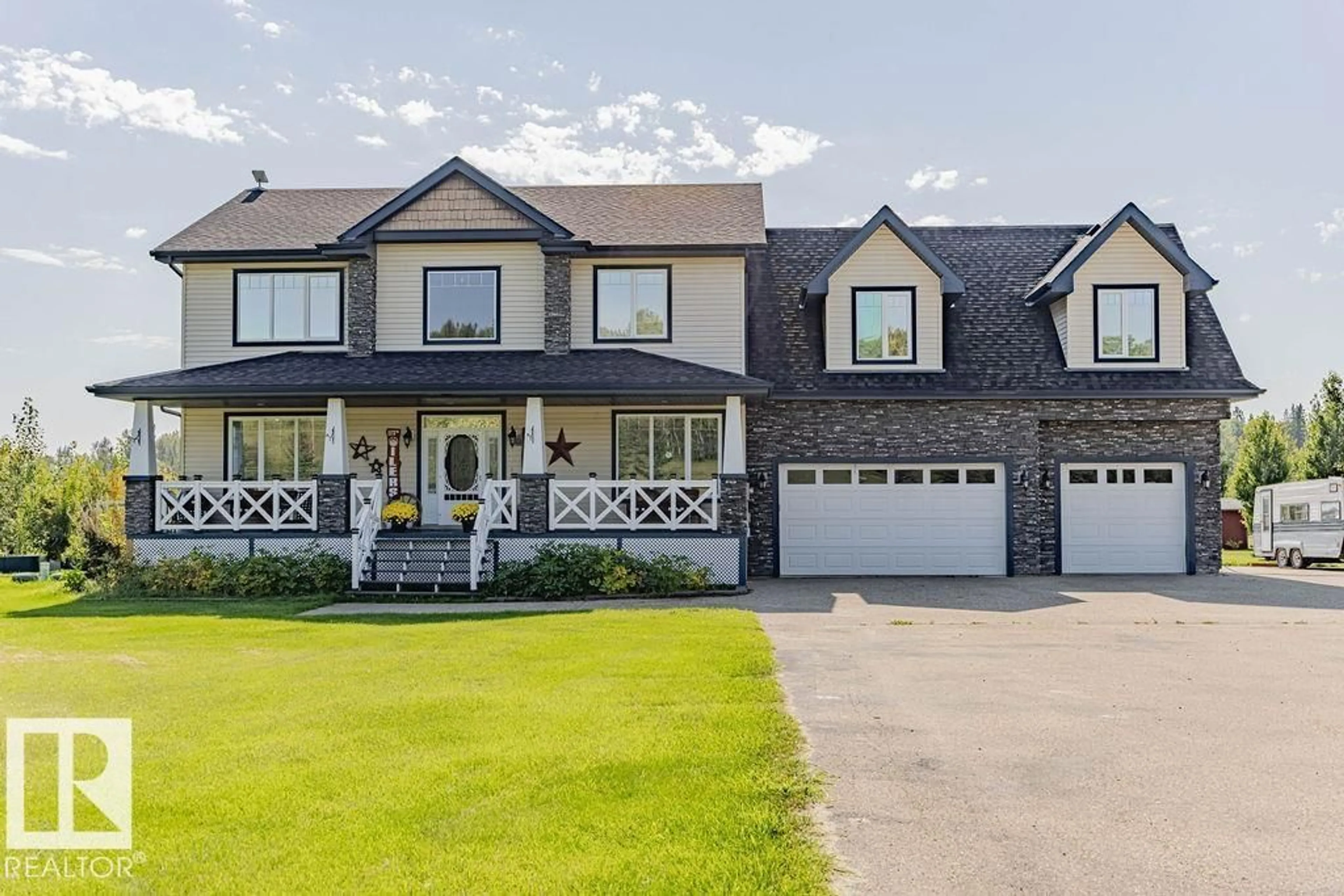 Home with vinyl exterior material, street for 55109 - 421 HWY 777, Rural Lac Ste. Anne County Alberta T0E1V0