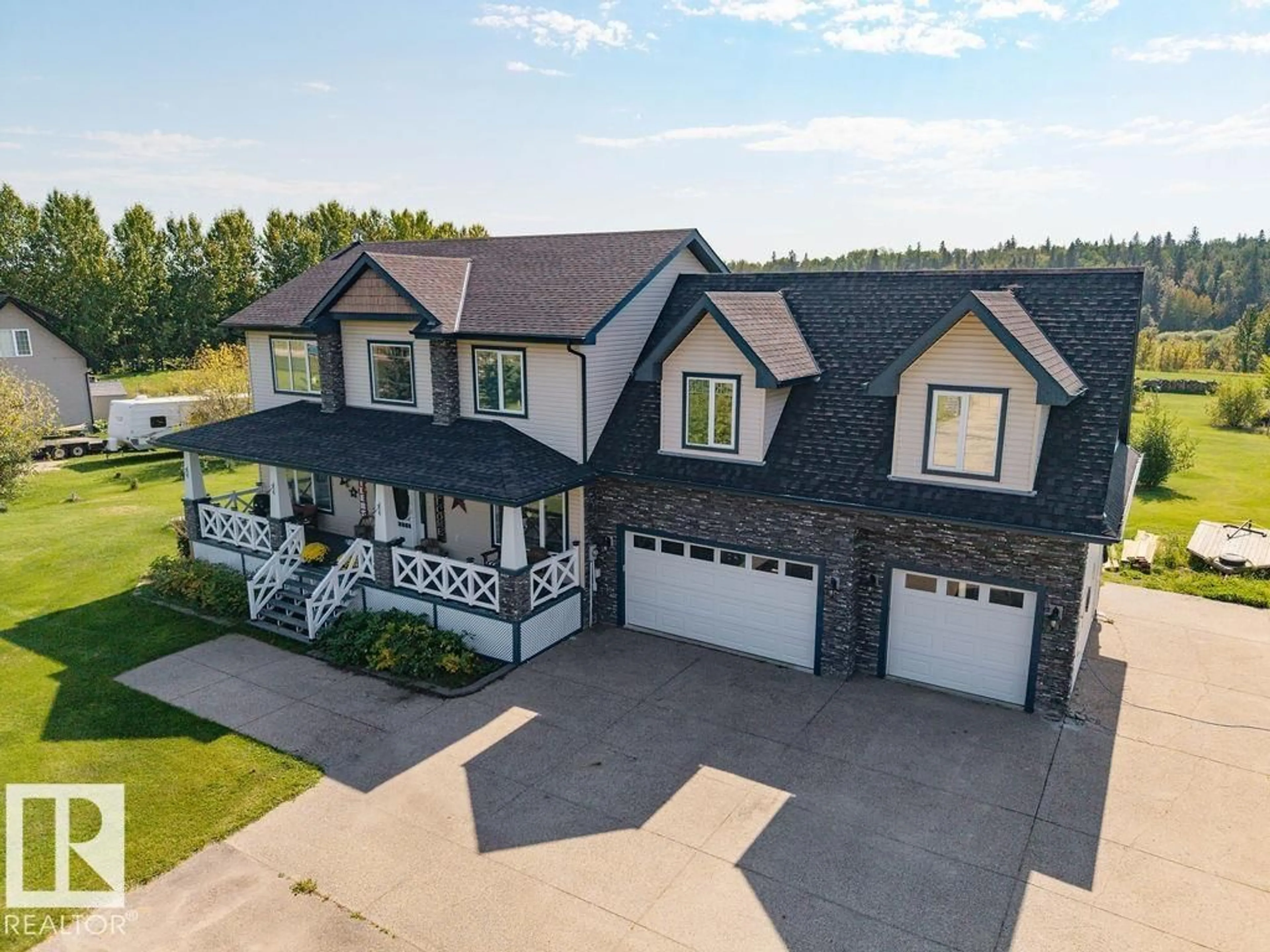 A pic from outside/outdoor area/front of a property/back of a property/a pic from drone, unknown for 55109 - 421 HWY 777, Rural Lac Ste. Anne County Alberta T0E1V0