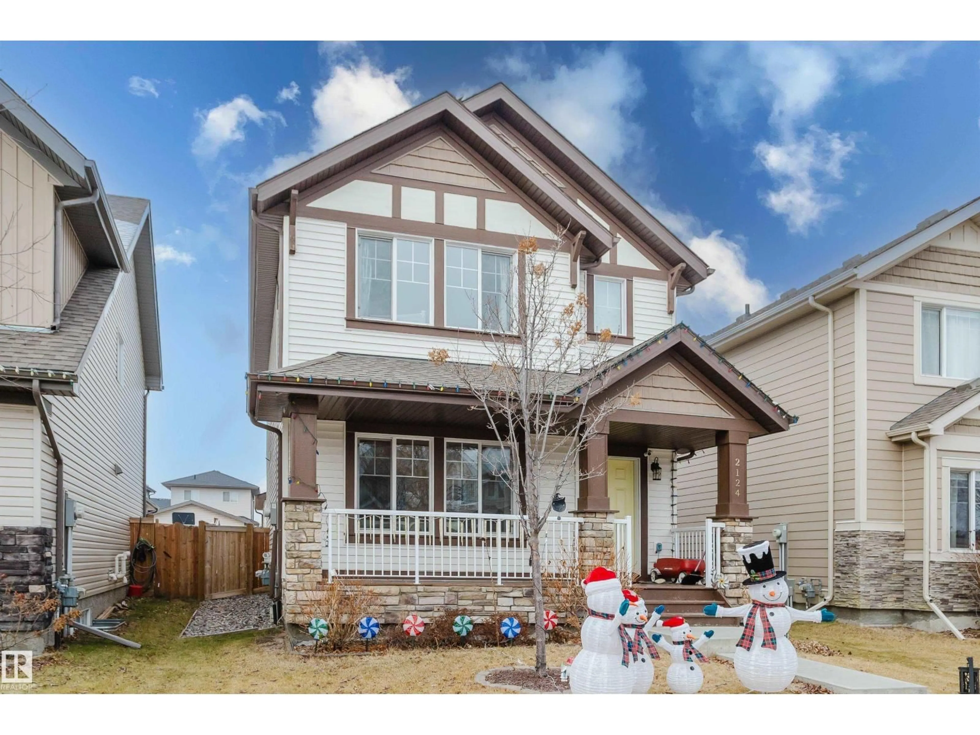 Home with vinyl exterior material, street for 2124 GLENRIDDING WY, Edmonton Alberta T6W2H4