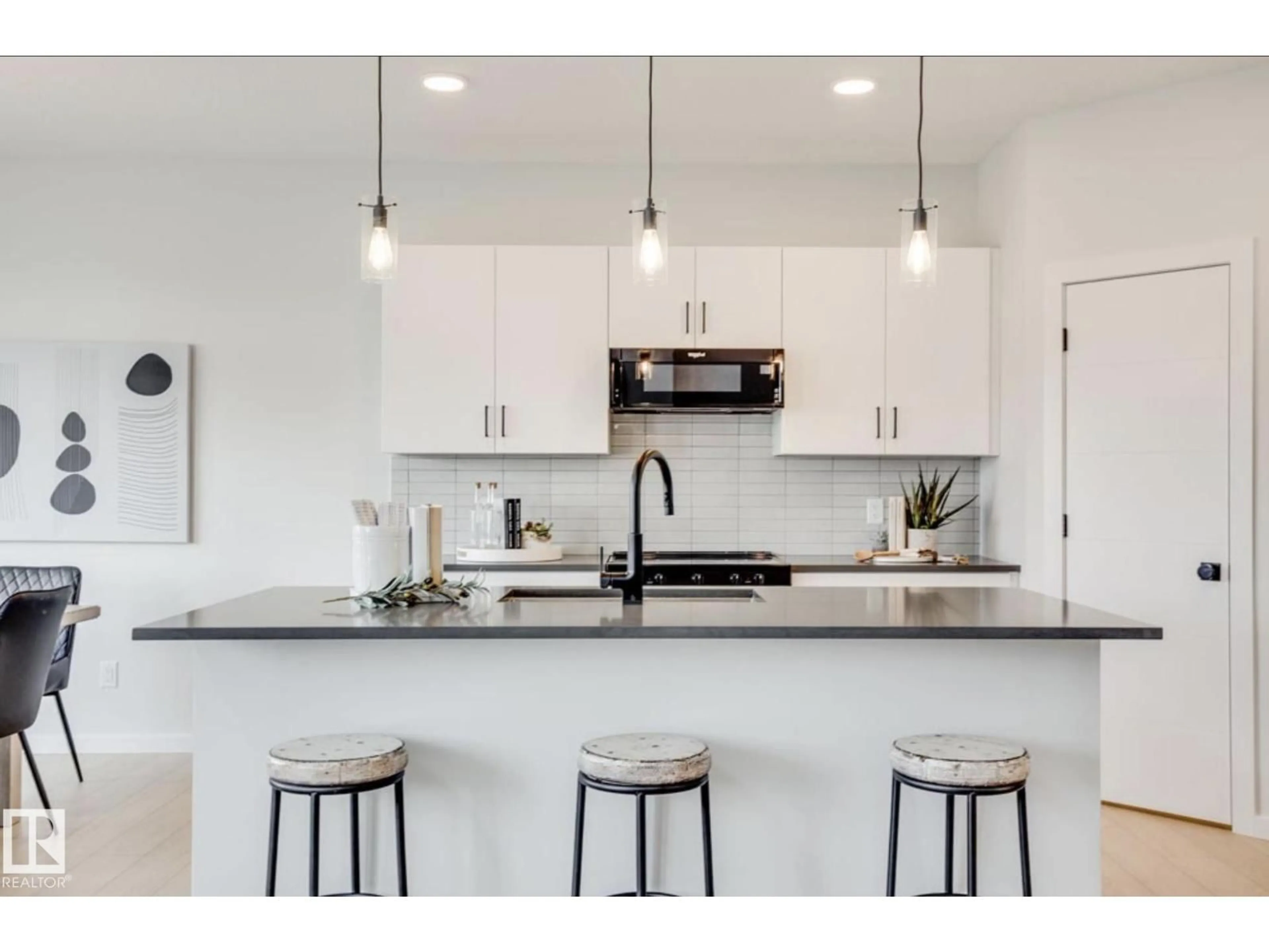 Open concept kitchen, ceramic/tile floor for 2535 211 ST, Edmonton Alberta T6M3H1