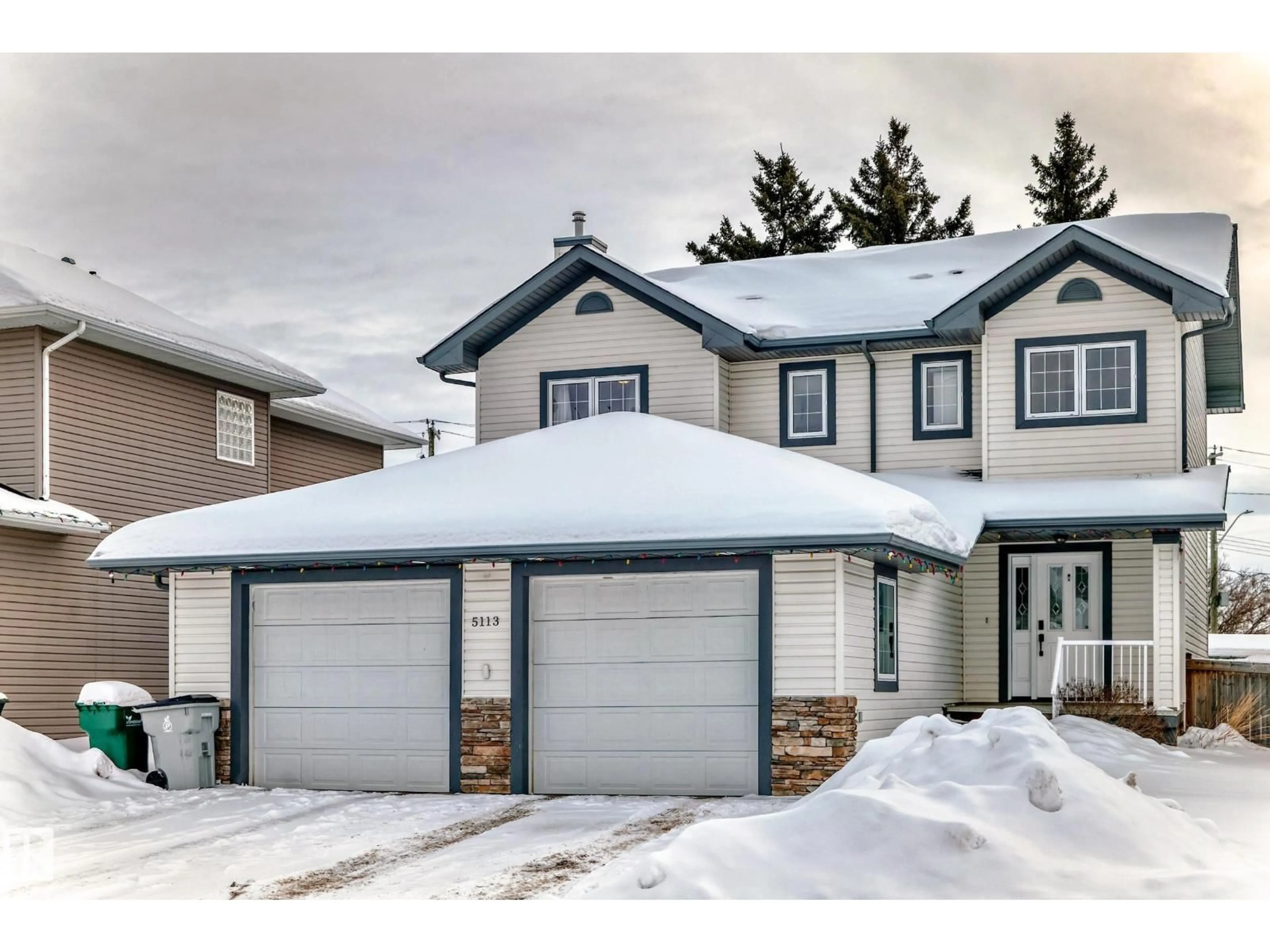 Home with vinyl exterior material, street for 5113 BON ACRES CR, Bon Accord Alberta T0A0K0