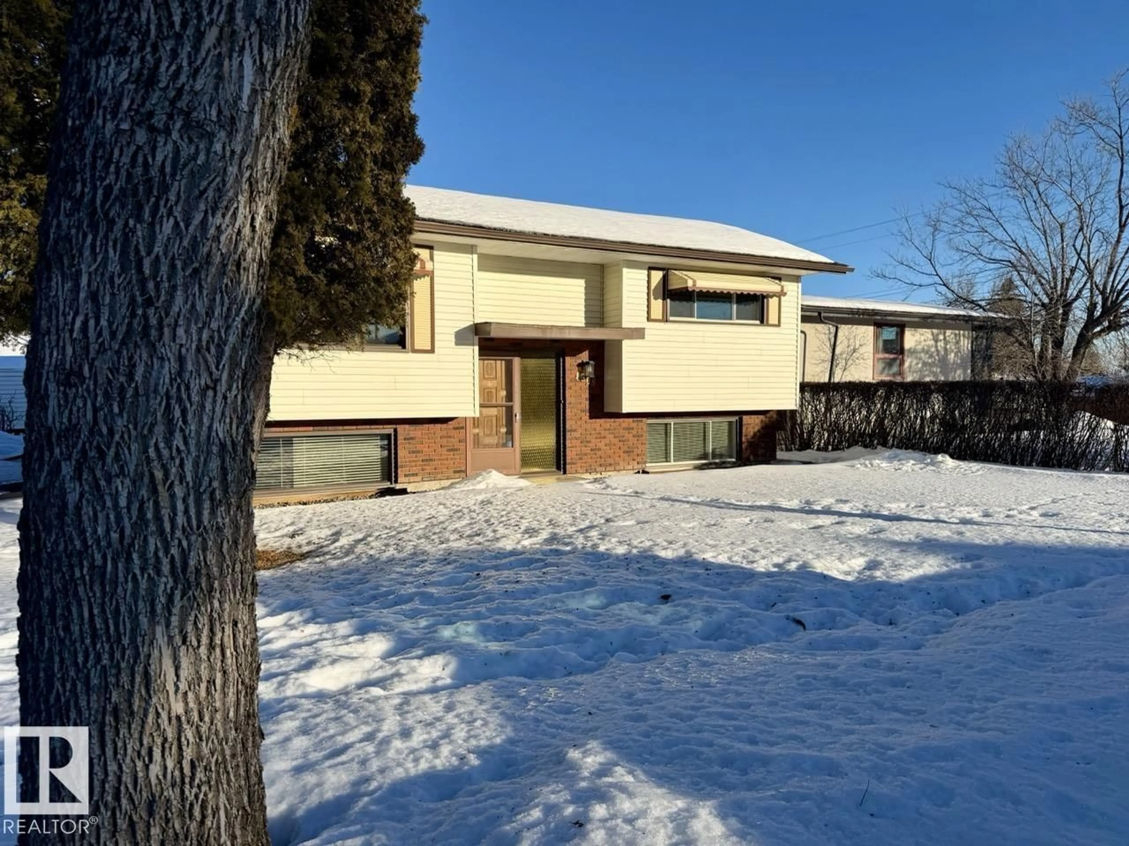 A pic from outside/outdoor area/front of a property/back of a property/a pic from drone, building for 4508 44 AV, Drayton Valley Alberta T7A1G7