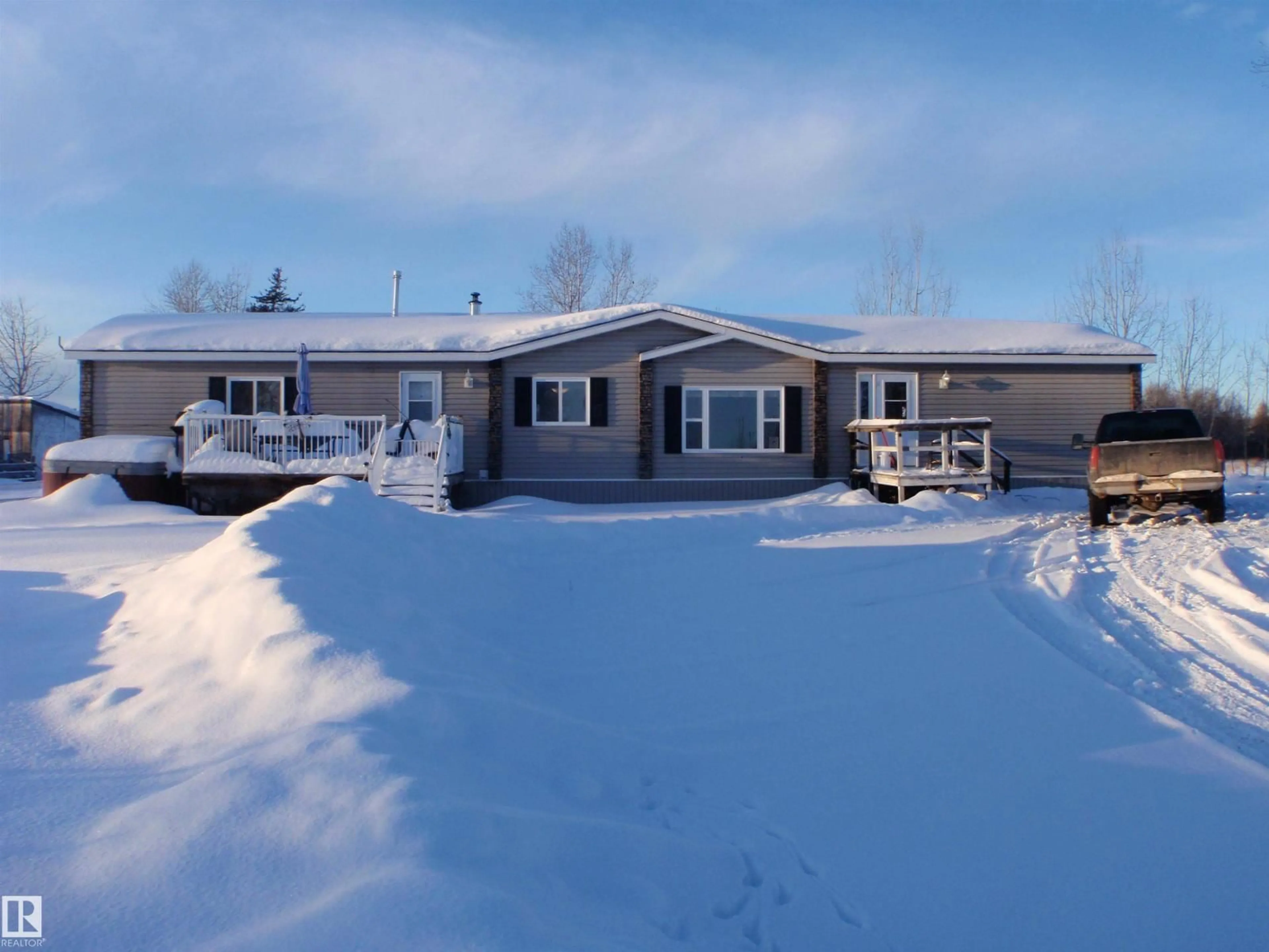 A pic from outside/outdoor area/front of a property/back of a property/a pic from drone, street for 57516 HWY 764, Rural Barrhead County Alberta T7N1N3