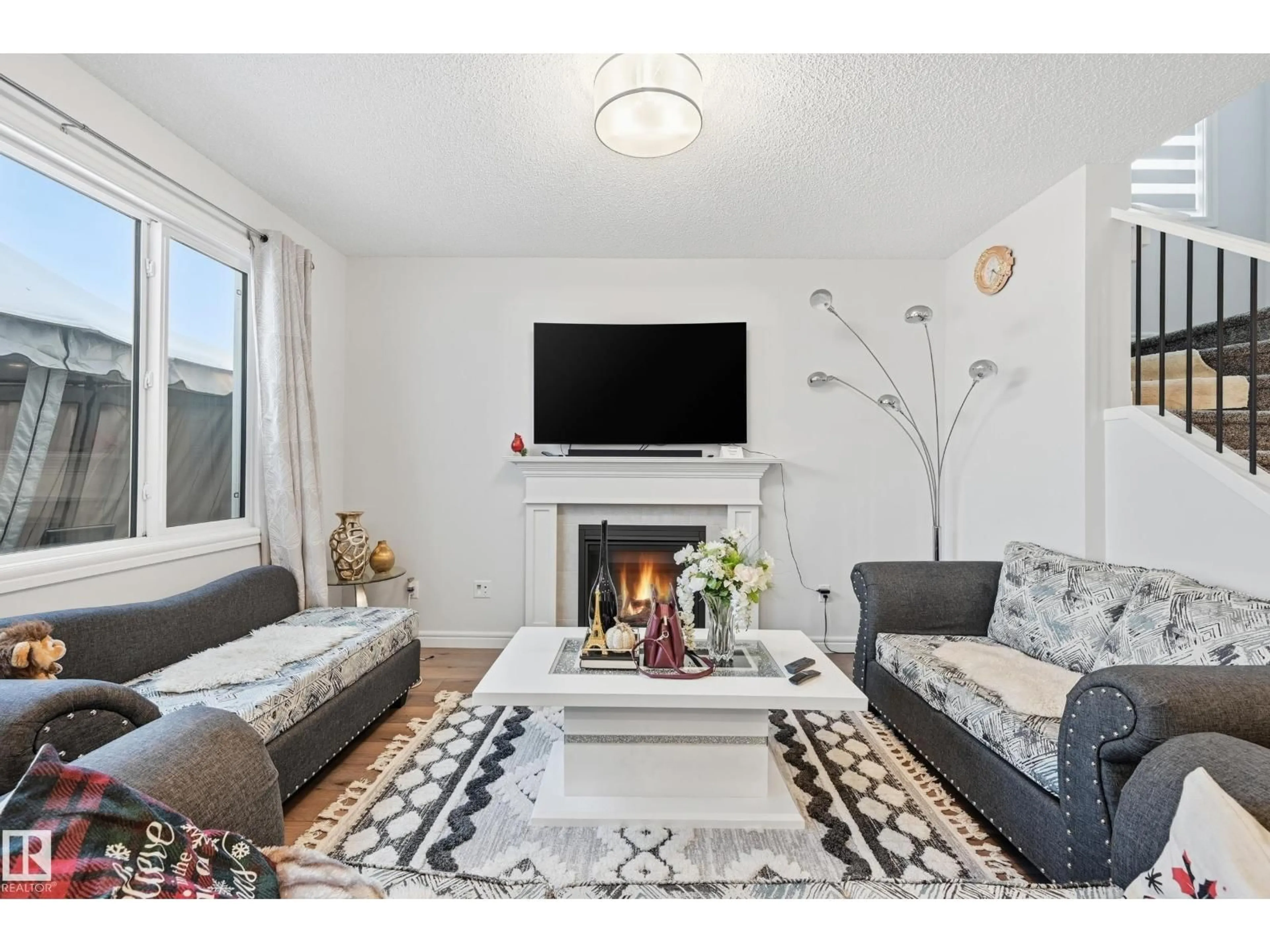 Living room with furniture, unknown for NW - 4820 175 AV, Edmonton Alberta T5Y4C6