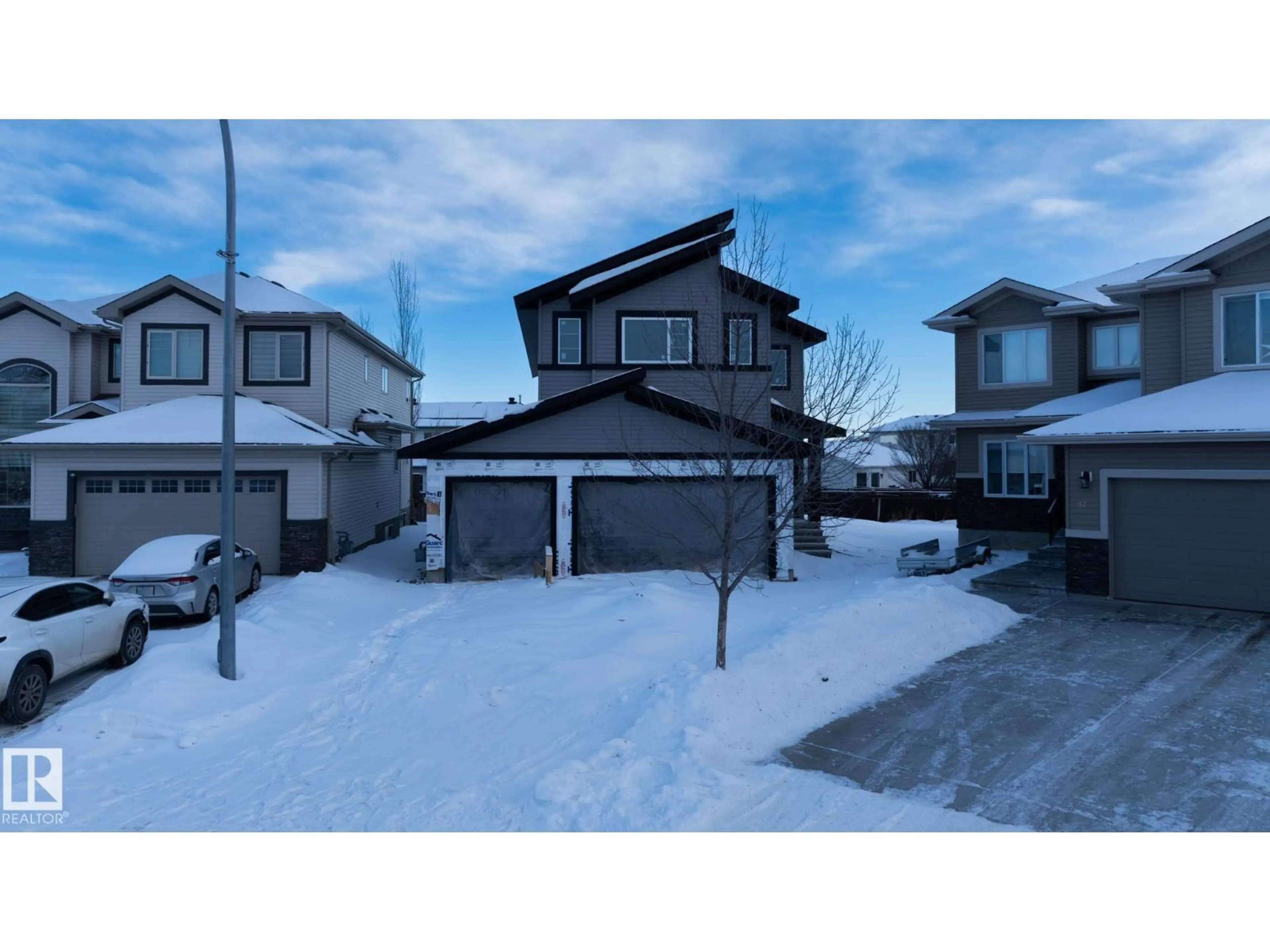 A pic from outside/outdoor area/front of a property/back of a property/a pic from drone, street for 34 MCKENZIE CL, Leduc Alberta T9E0P2