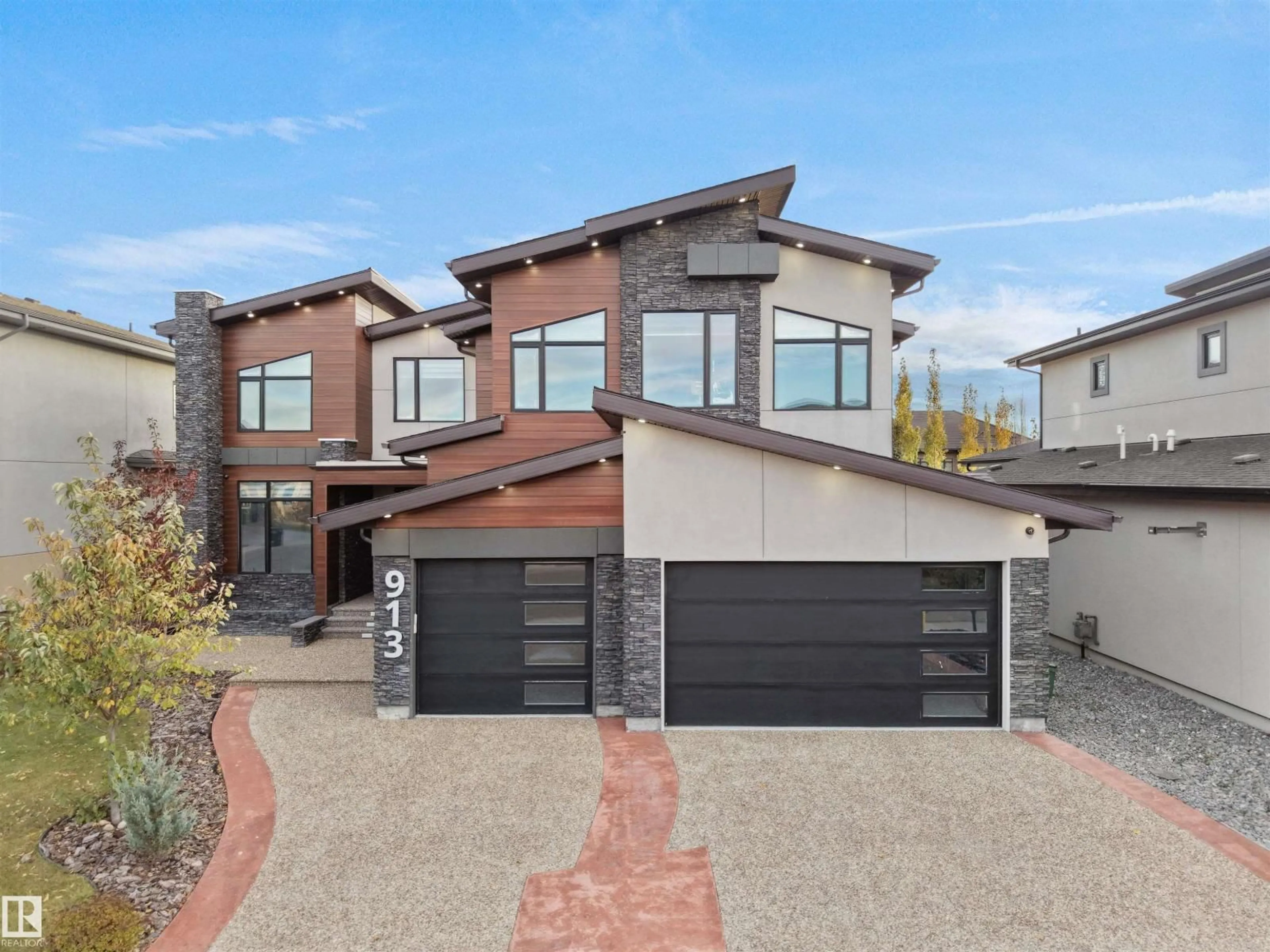 Home with brick exterior material, street for 913 WOOD PL, Edmonton Alberta T6W3G8