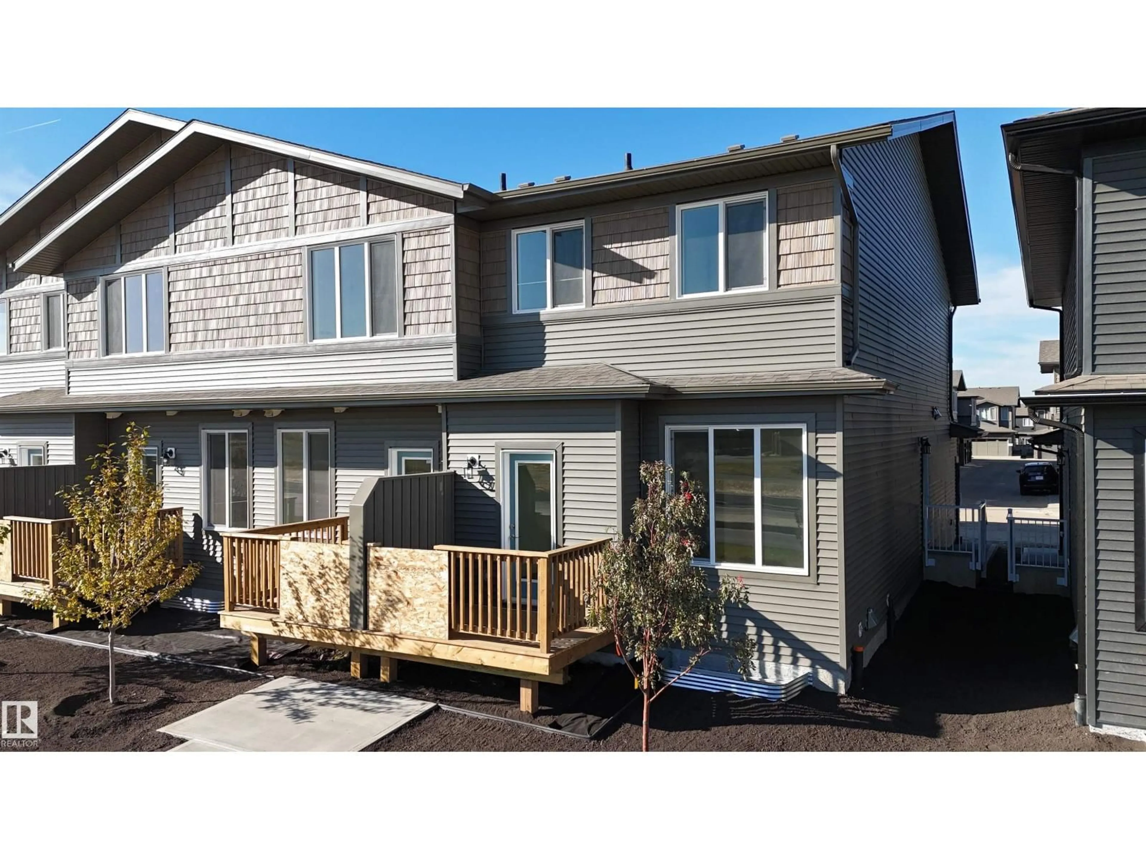 Home with vinyl exterior material, street for #11 - 2710 66 ST, Edmonton Alberta T6X3H4