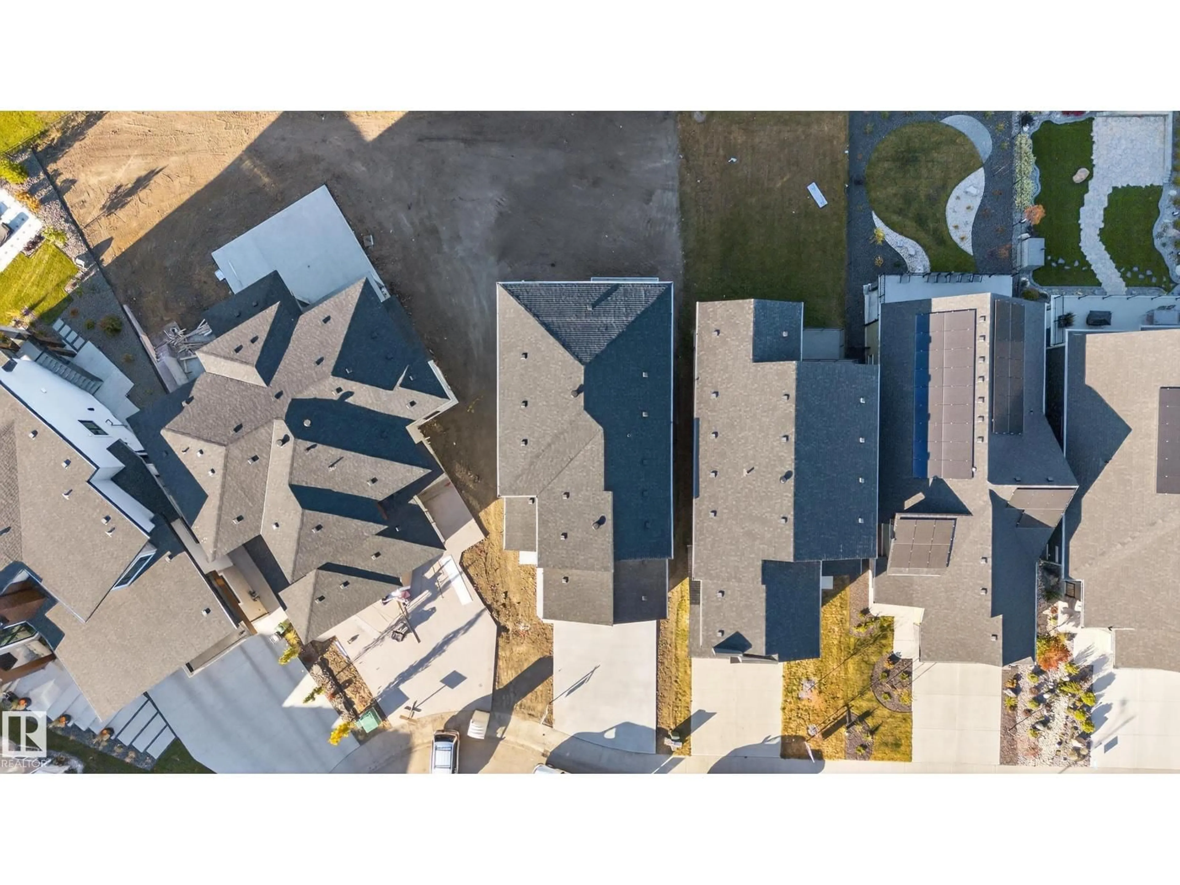 A pic from outside/outdoor area/front of a property/back of a property/a pic from drone, street for 160 EDGEWATER CI, Leduc Alberta T9E1K5