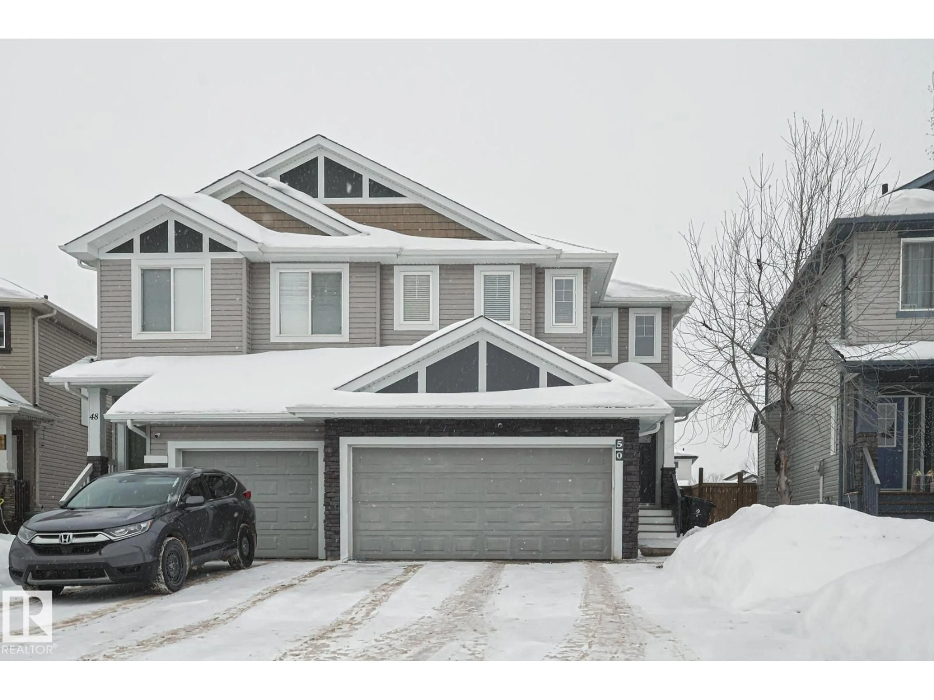 Home with vinyl exterior material, street for 50 WOODBRIDGE LI, Fort Saskatchewan Alberta T8L0H8