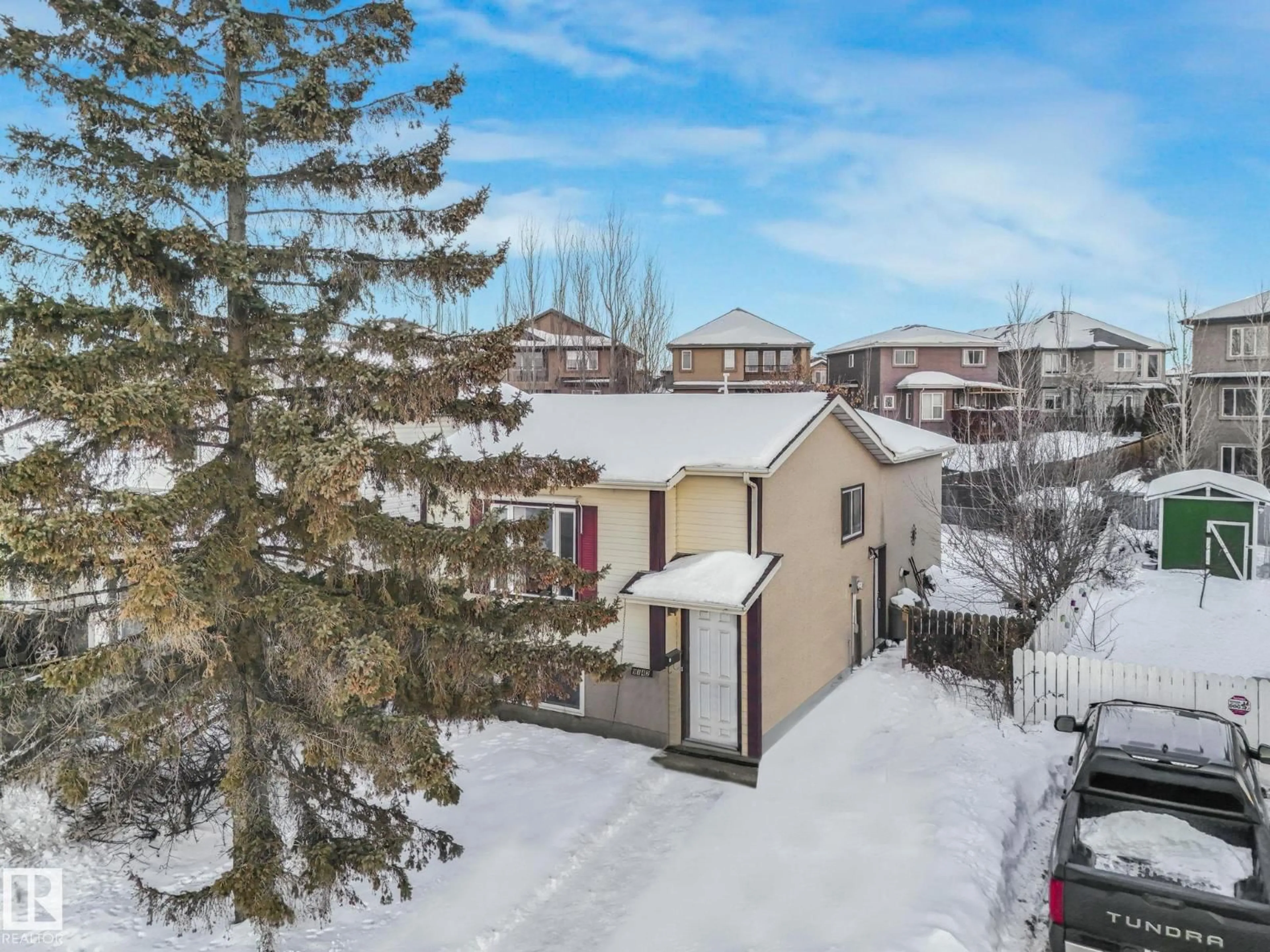 A pic from outside/outdoor area/front of a property/back of a property/a pic from drone, street for 9142 180A AV, Edmonton Alberta T5Z2K2