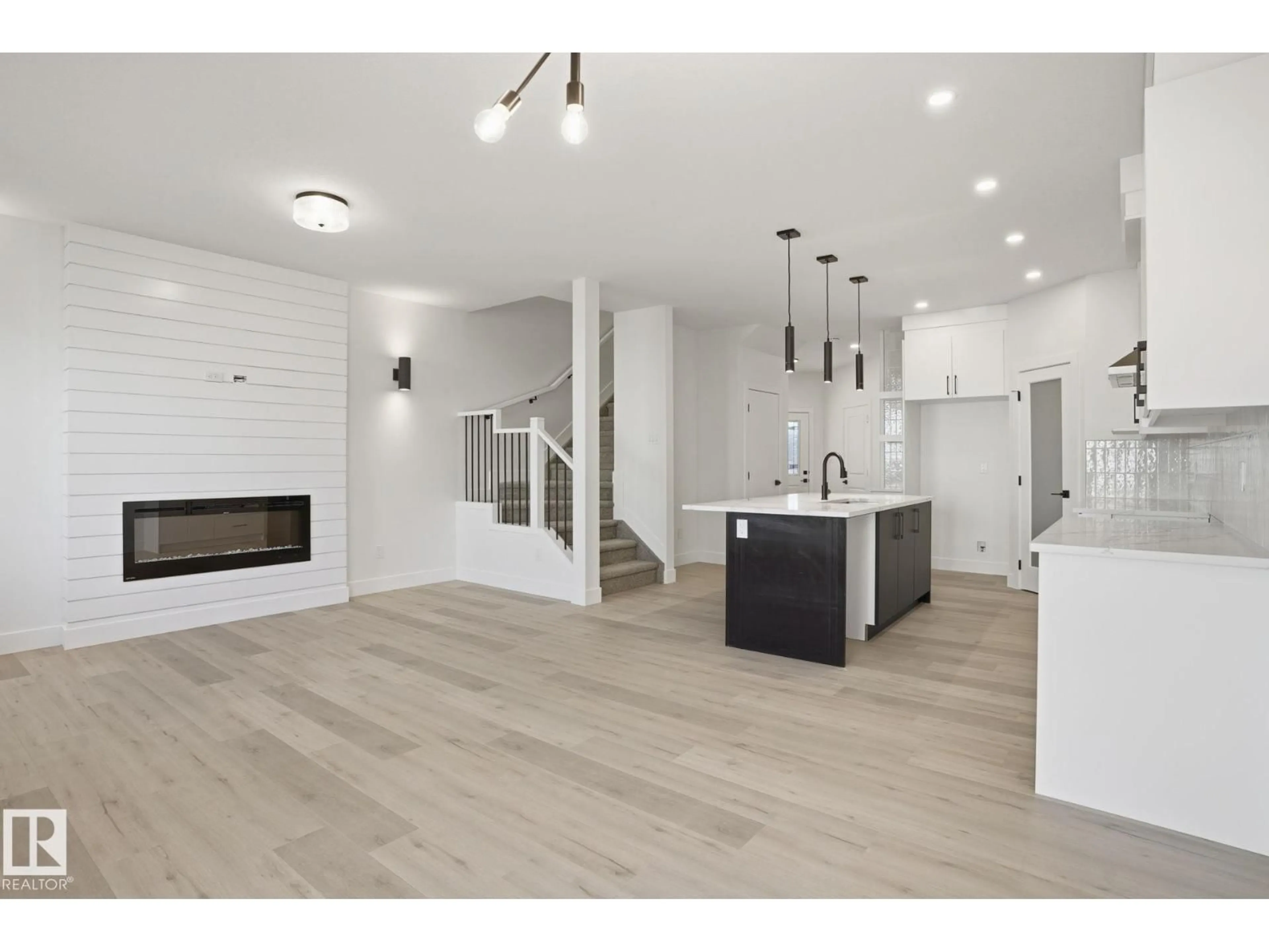 Open concept kitchen, wood/laminate floor for 116 SPRING LI, Spruce Grove Alberta T7X2X7