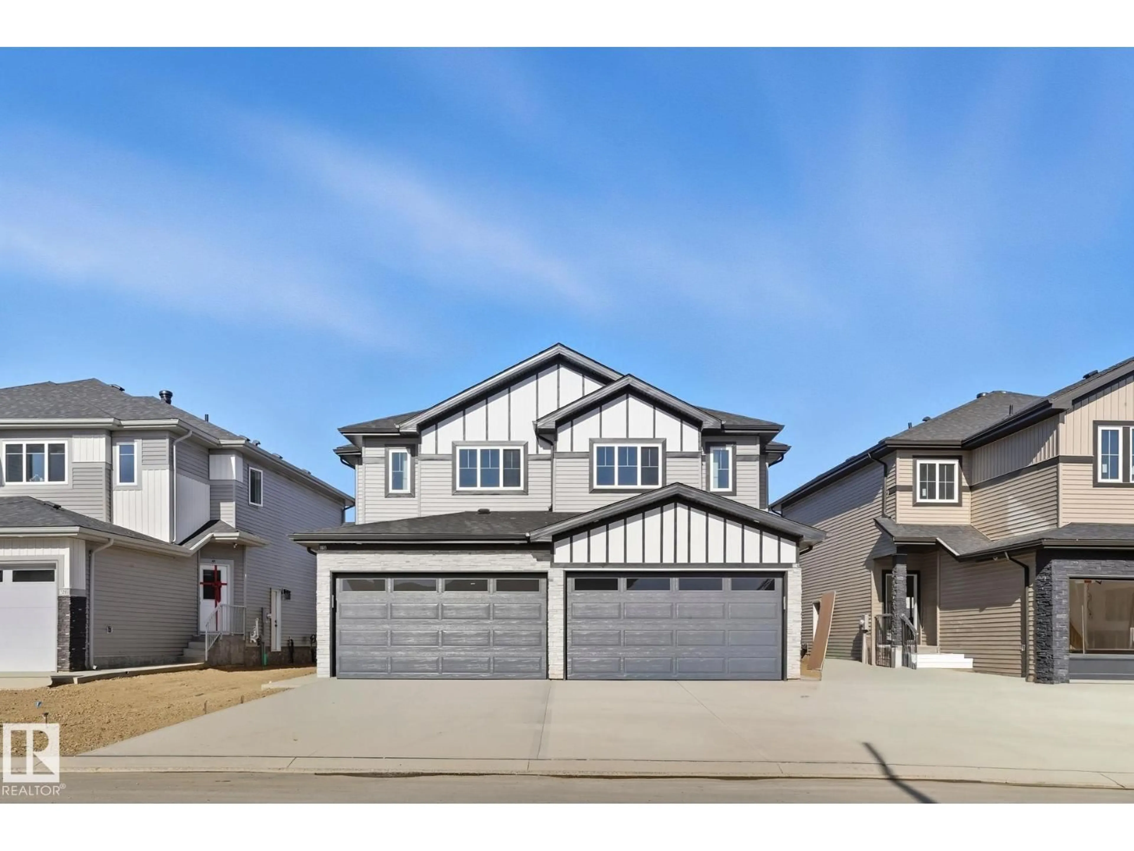 Home with vinyl exterior material, street for 116 SPRING LI, Spruce Grove Alberta T7X2X7