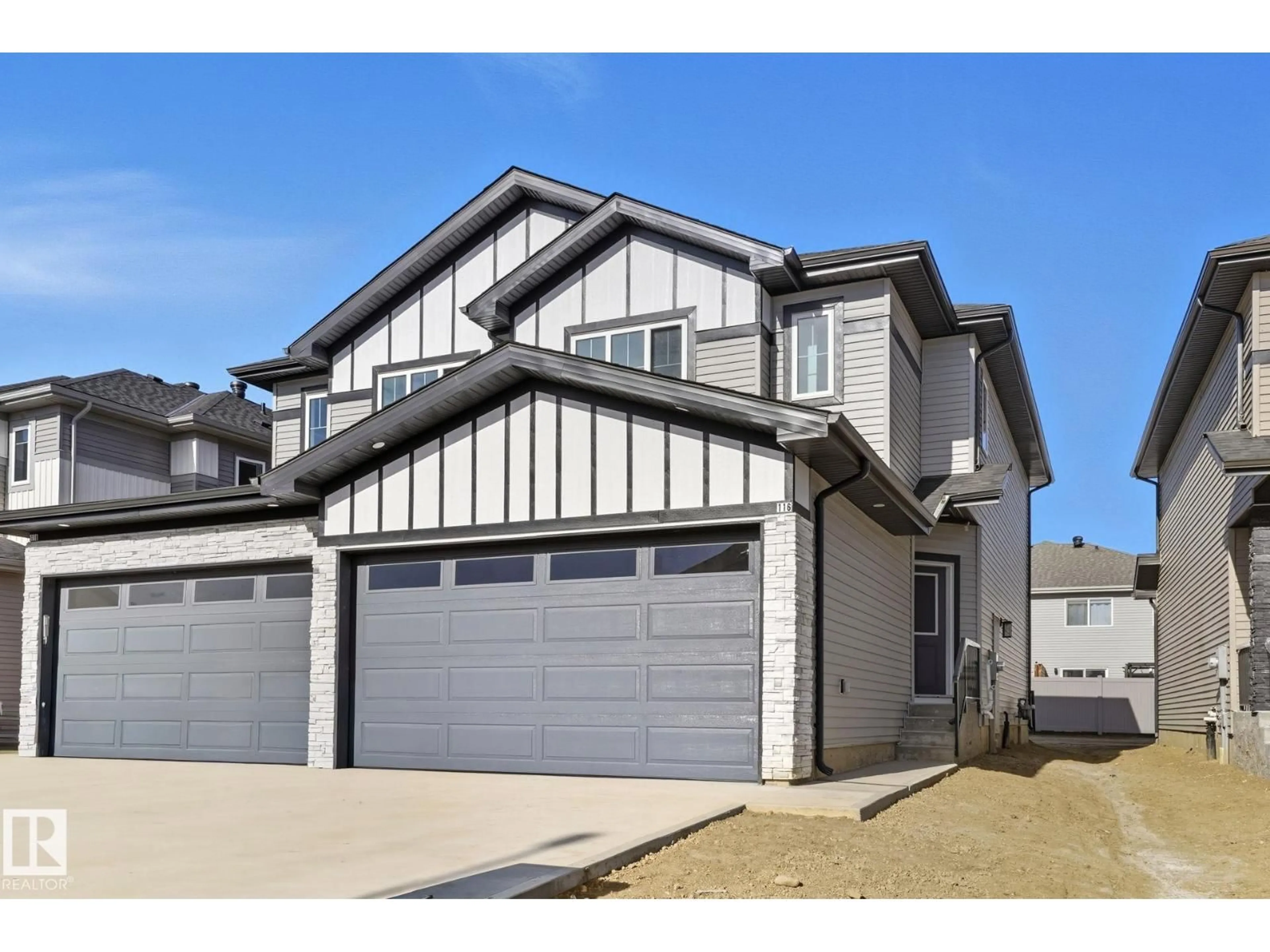 Home with vinyl exterior material, street for 116 SPRING LI, Spruce Grove Alberta T7X2X7