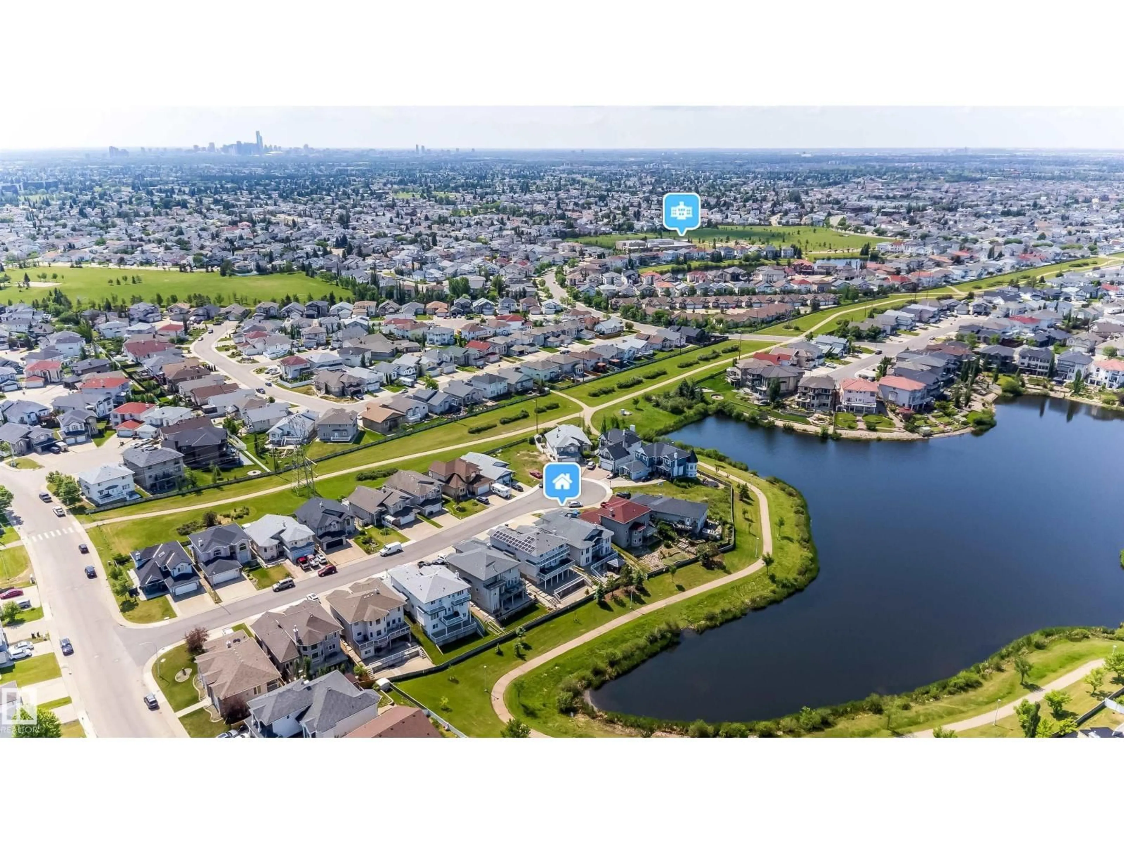 A pic from outside/outdoor area/front of a property/back of a property/a pic from drone, water/lake/river/ocean view for 6928 164 AV, Edmonton Alberta T5Z3R3