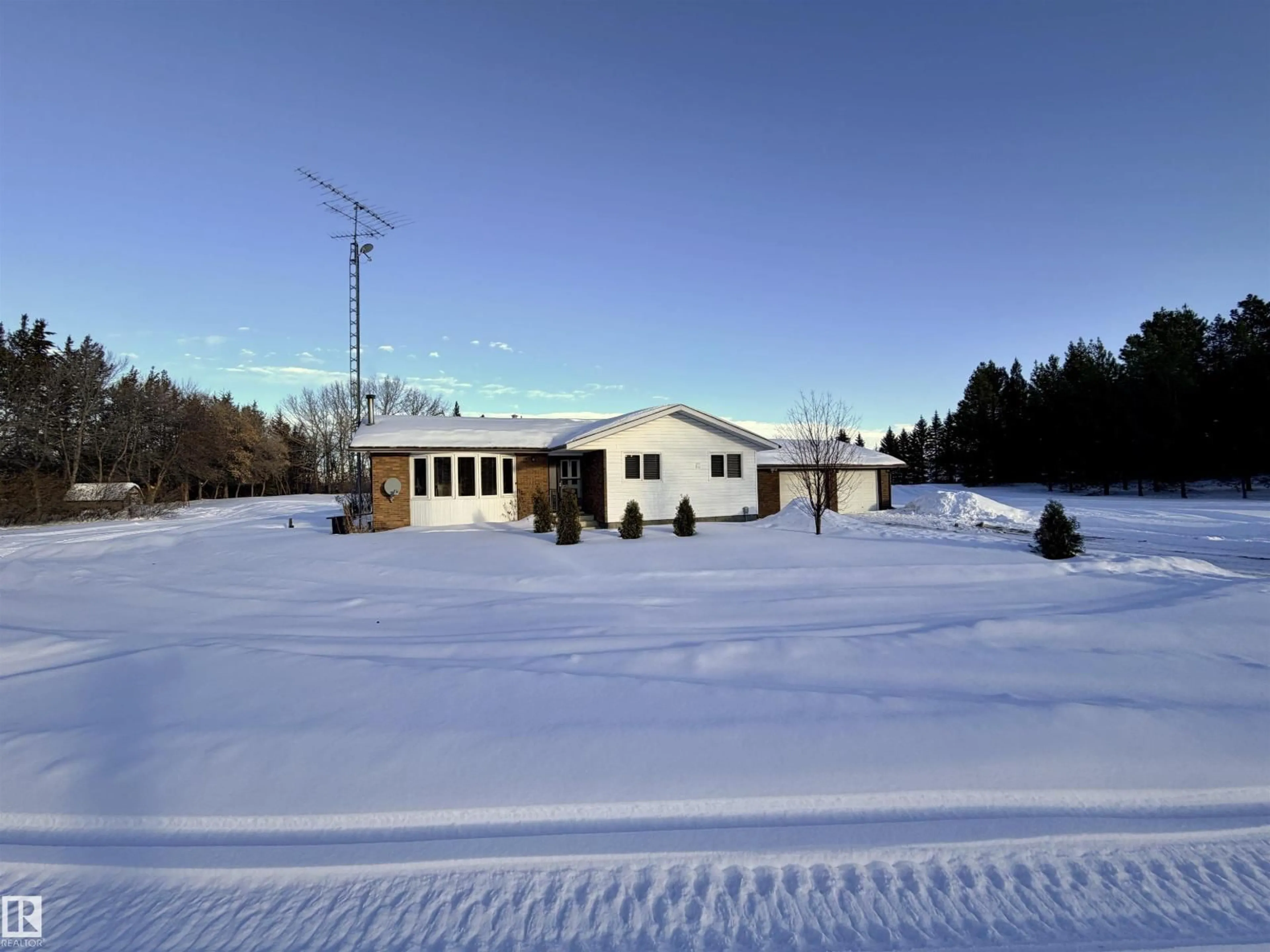 A pic from outside/outdoor area/front of a property/back of a property/a pic from drone, unknown for 203 - 58512 SEC 881, Rural St. Paul County Alberta T0A3A0