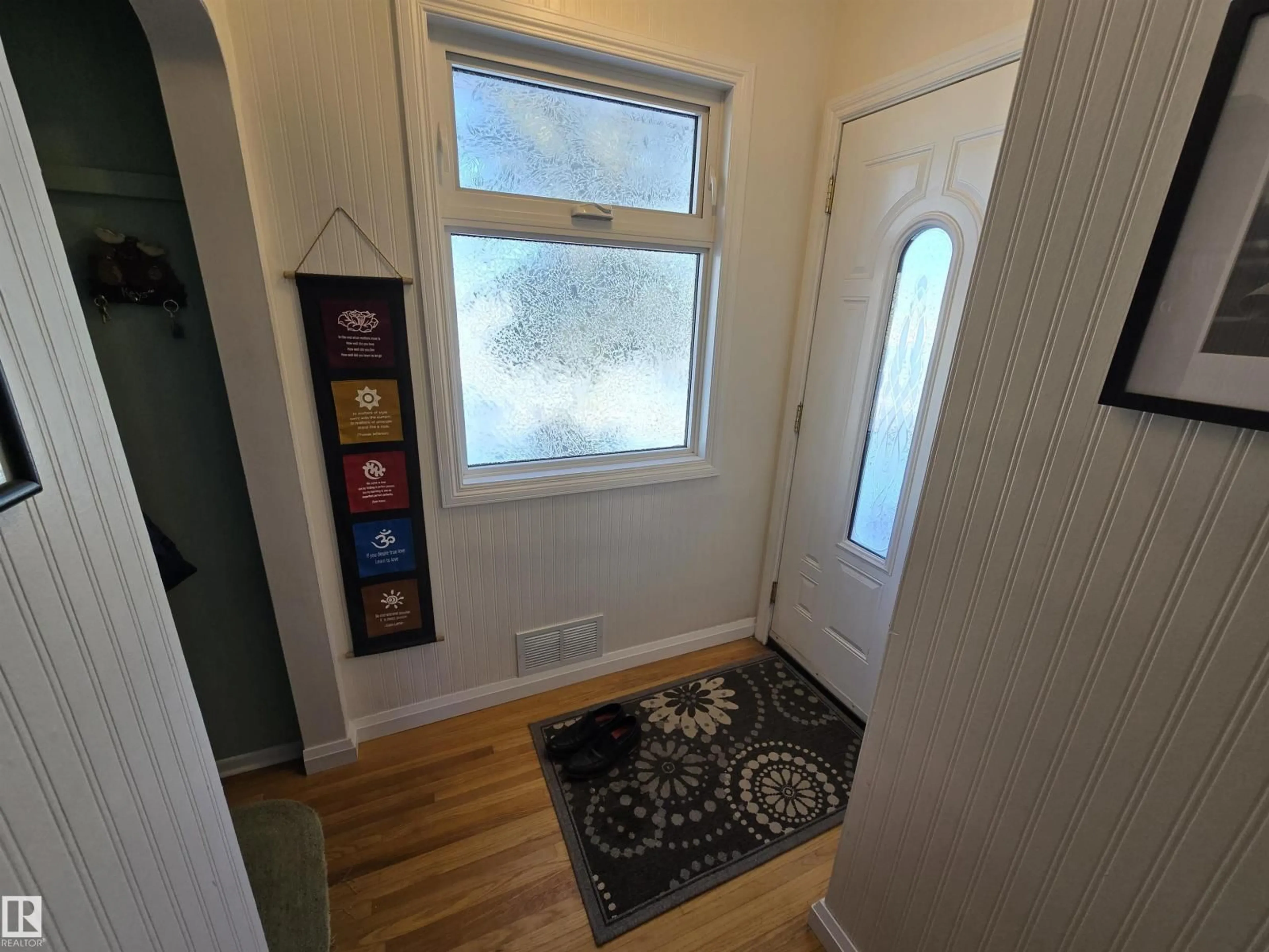 Indoor entryway for 11303 113A AV NW, Edmonton Alberta T5G0K1