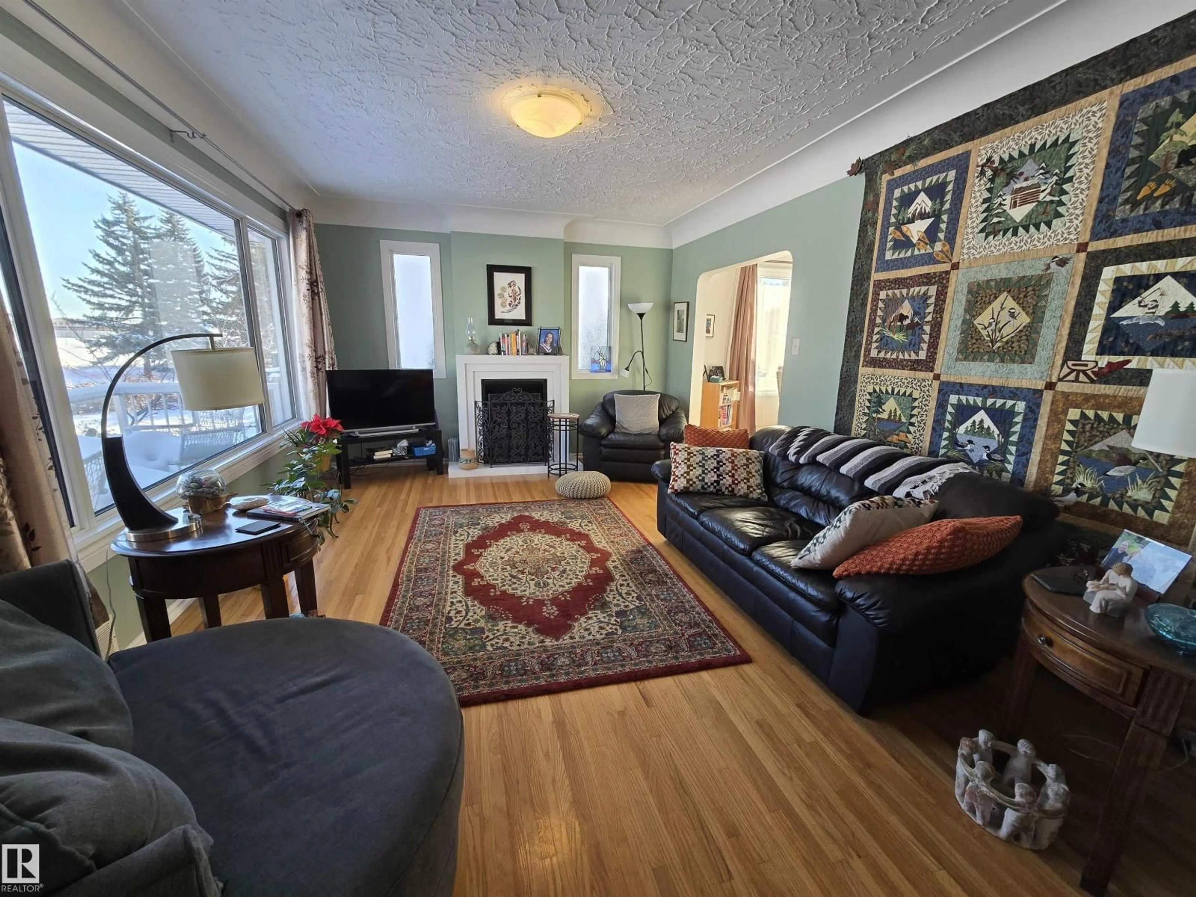 Living room with furniture, unknown for 11303 113A AV NW, Edmonton Alberta T5G0K1