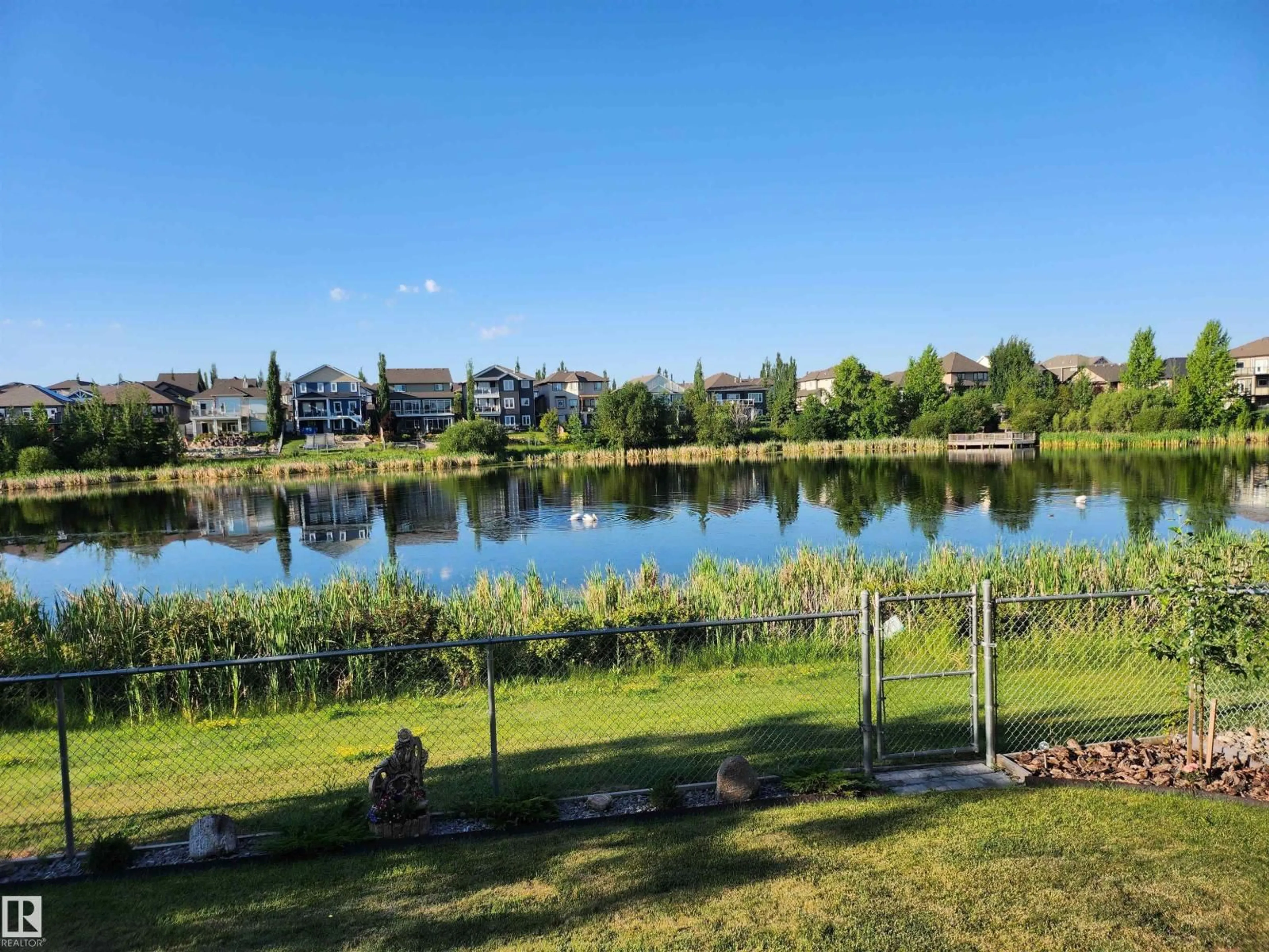 A pic from outside/outdoor area/front of a property/back of a property/a pic from drone, water/lake/river/ocean view for 466 CHURCHILL CR, Sherwood Park Alberta T8H0R9