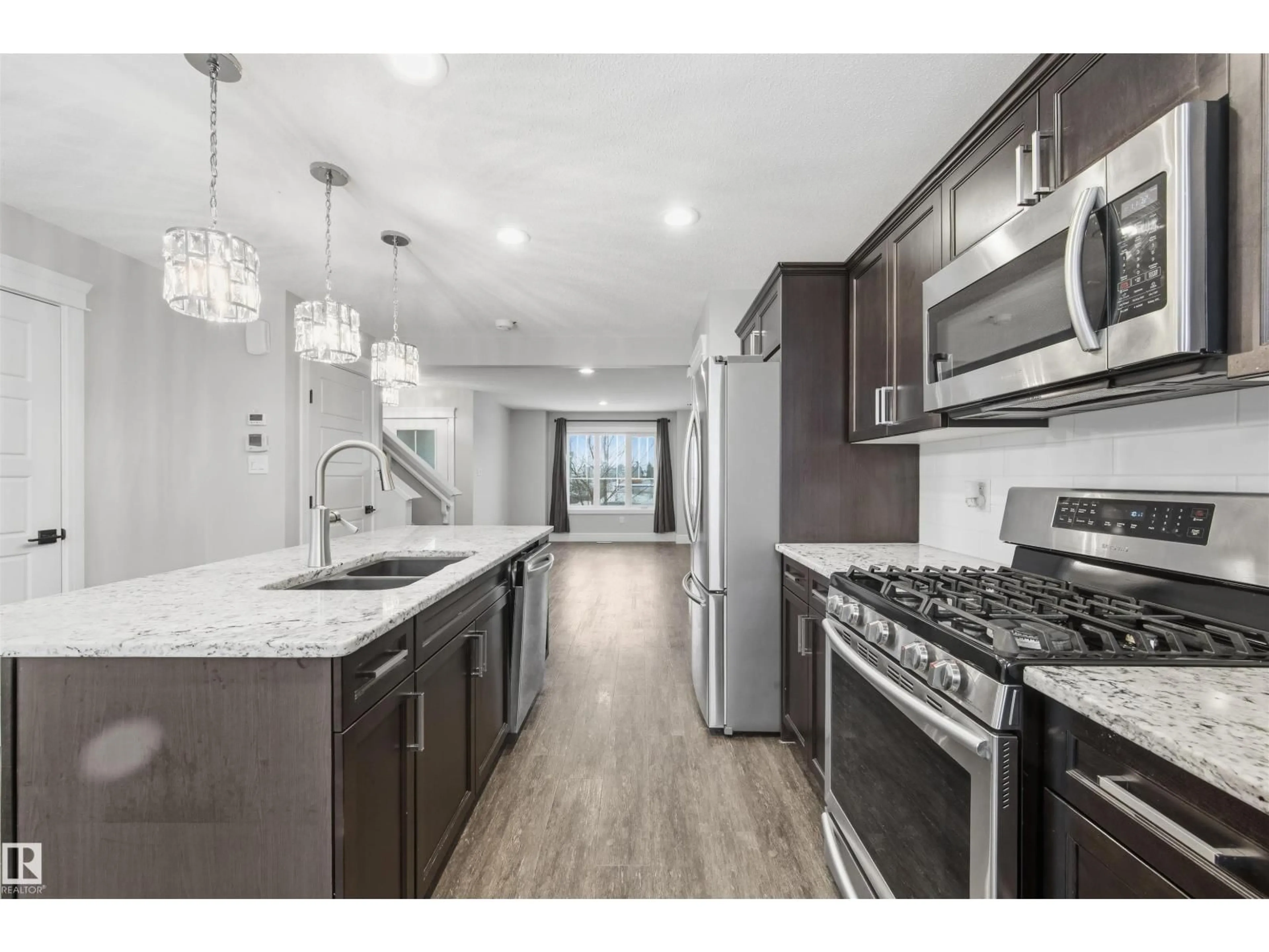 Open concept kitchen, unknown for 281 DESROCHERS BV, Edmonton Alberta T6W3H9