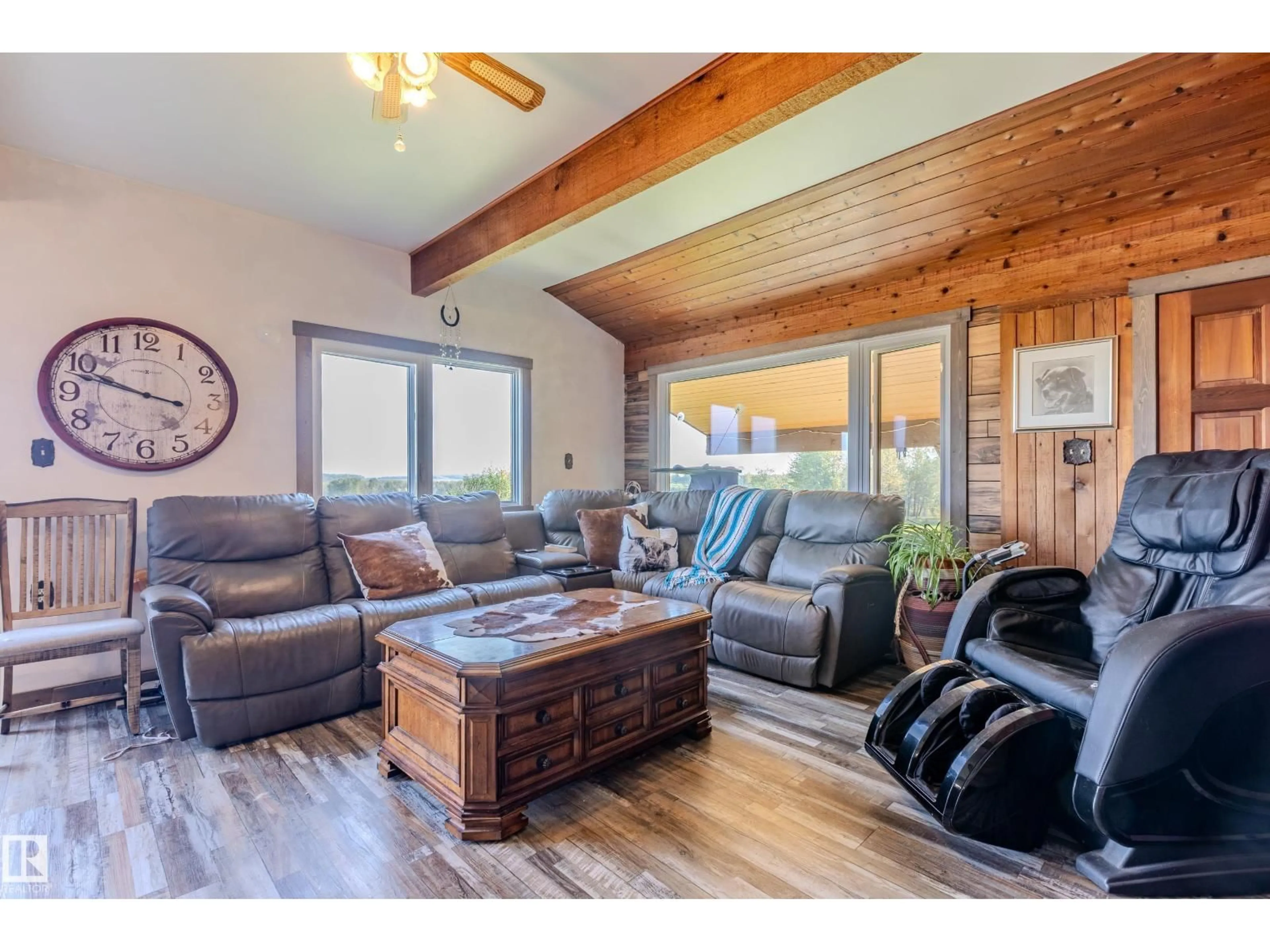 Living room with furniture, wood/laminate floor for 53122 RGE RD 95, Rural Yellowhead Alberta T0E2M0