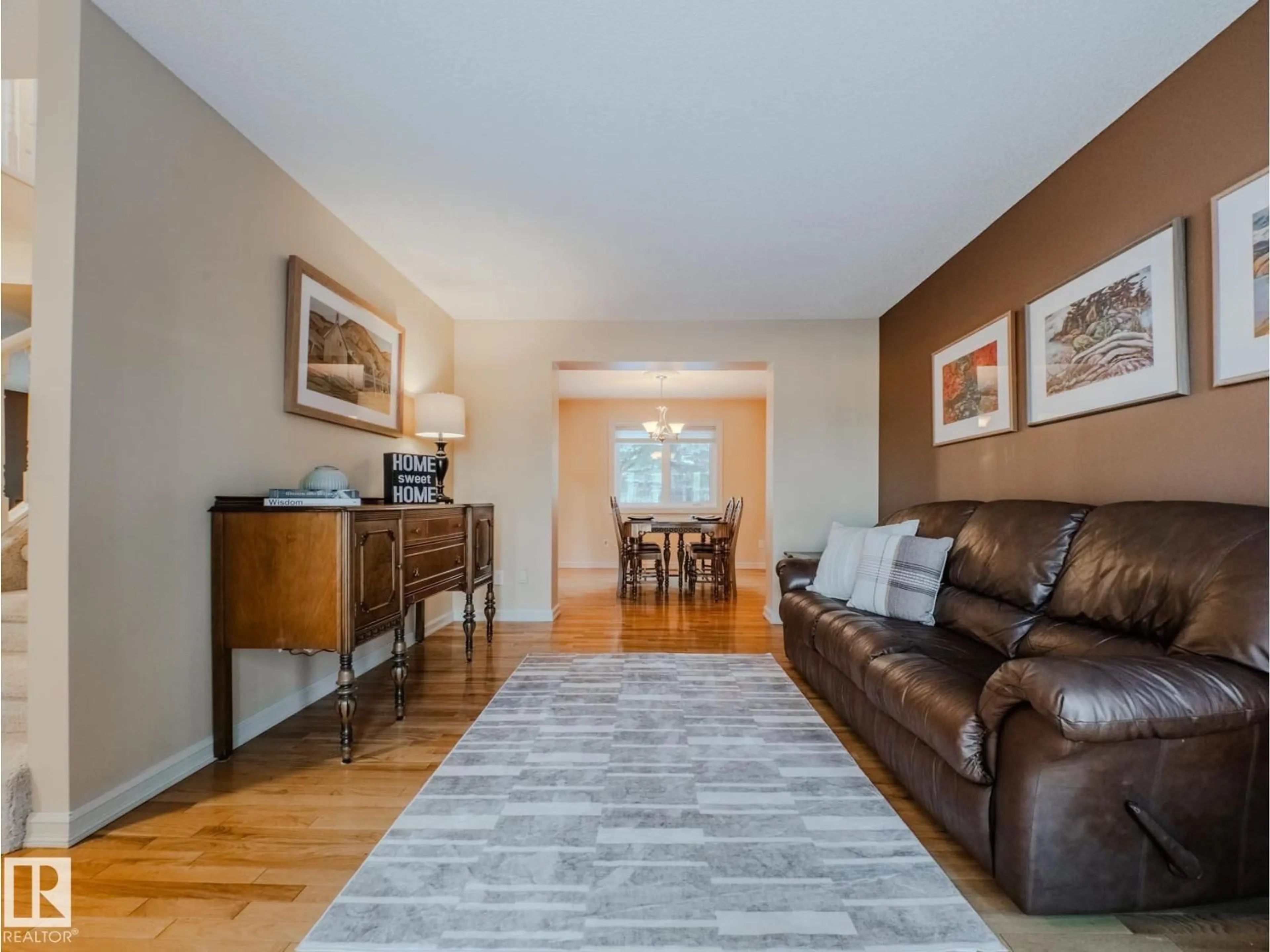 Living room with furniture, wood/laminate floor for 114 MEADOWVIEW DR, Sherwood Park Alberta T8H1M4