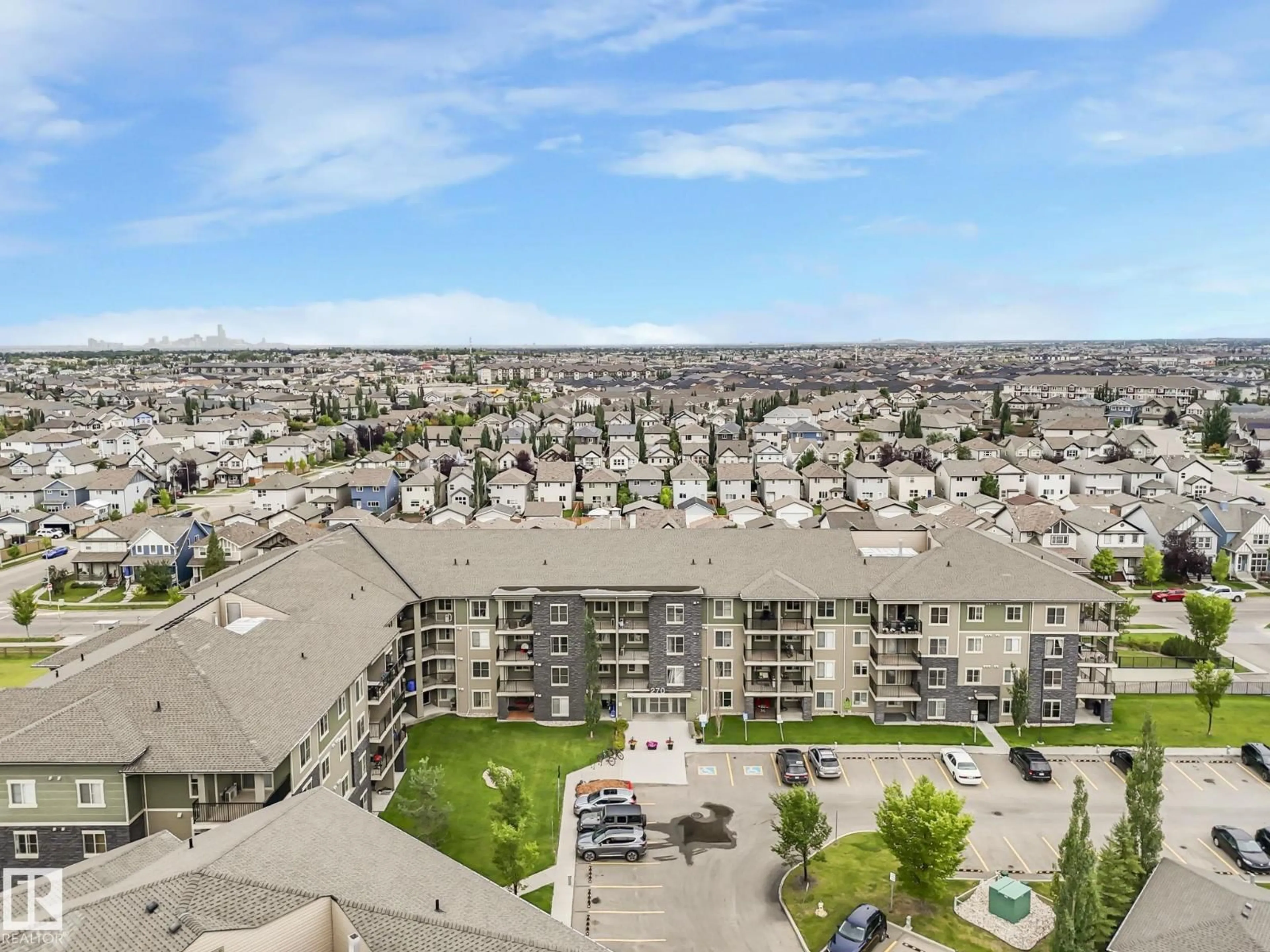 A pic from outside/outdoor area/front of a property/back of a property/a pic from drone, city buildings view from balcony for #404 - 270 MCCONACHIE DR, Edmonton Alberta T5Y3N4
