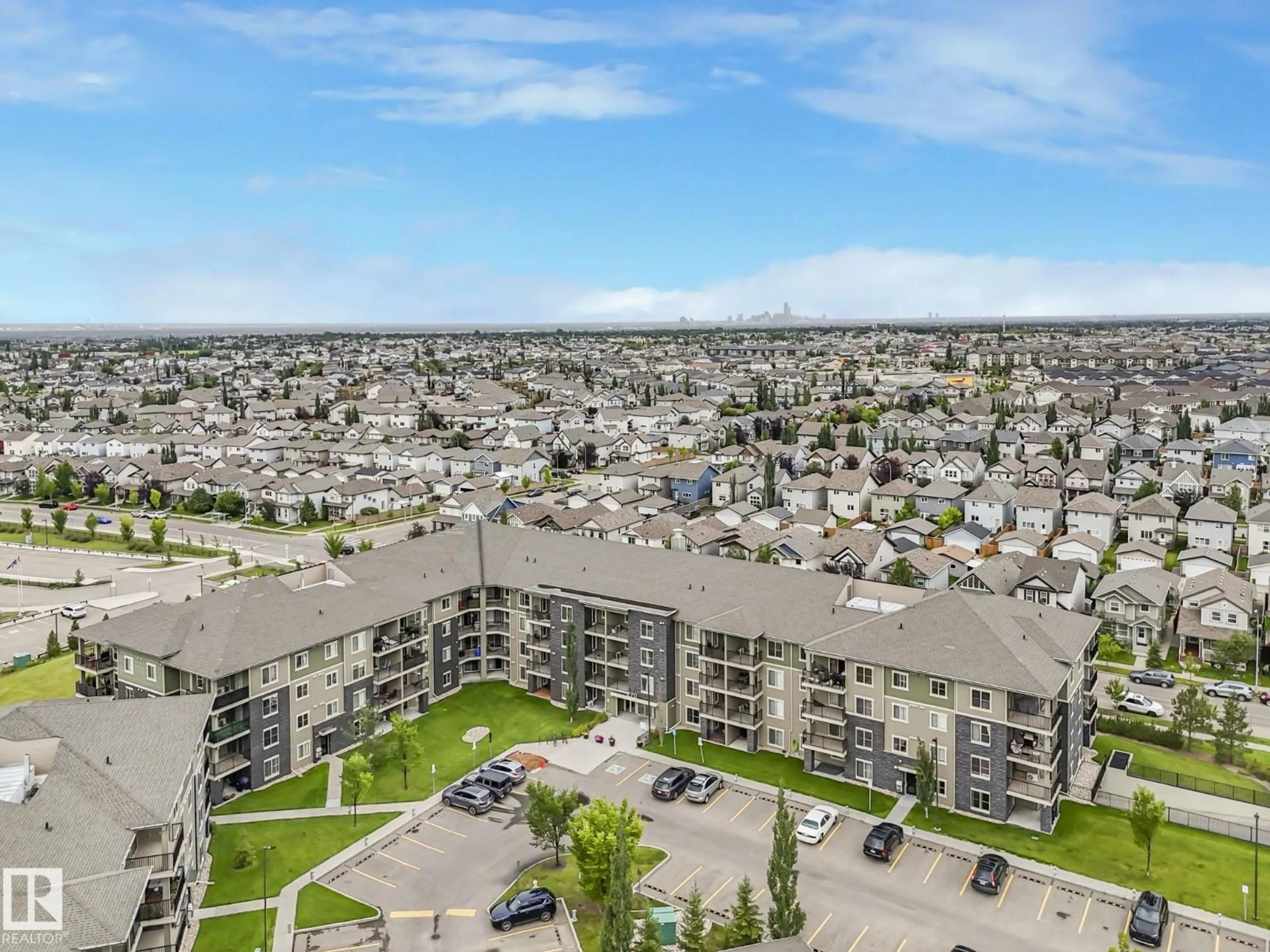 A pic from outside/outdoor area/front of a property/back of a property/a pic from drone, city buildings view from balcony for #404 - 270 MCCONACHIE DR, Edmonton Alberta T5Y3N4