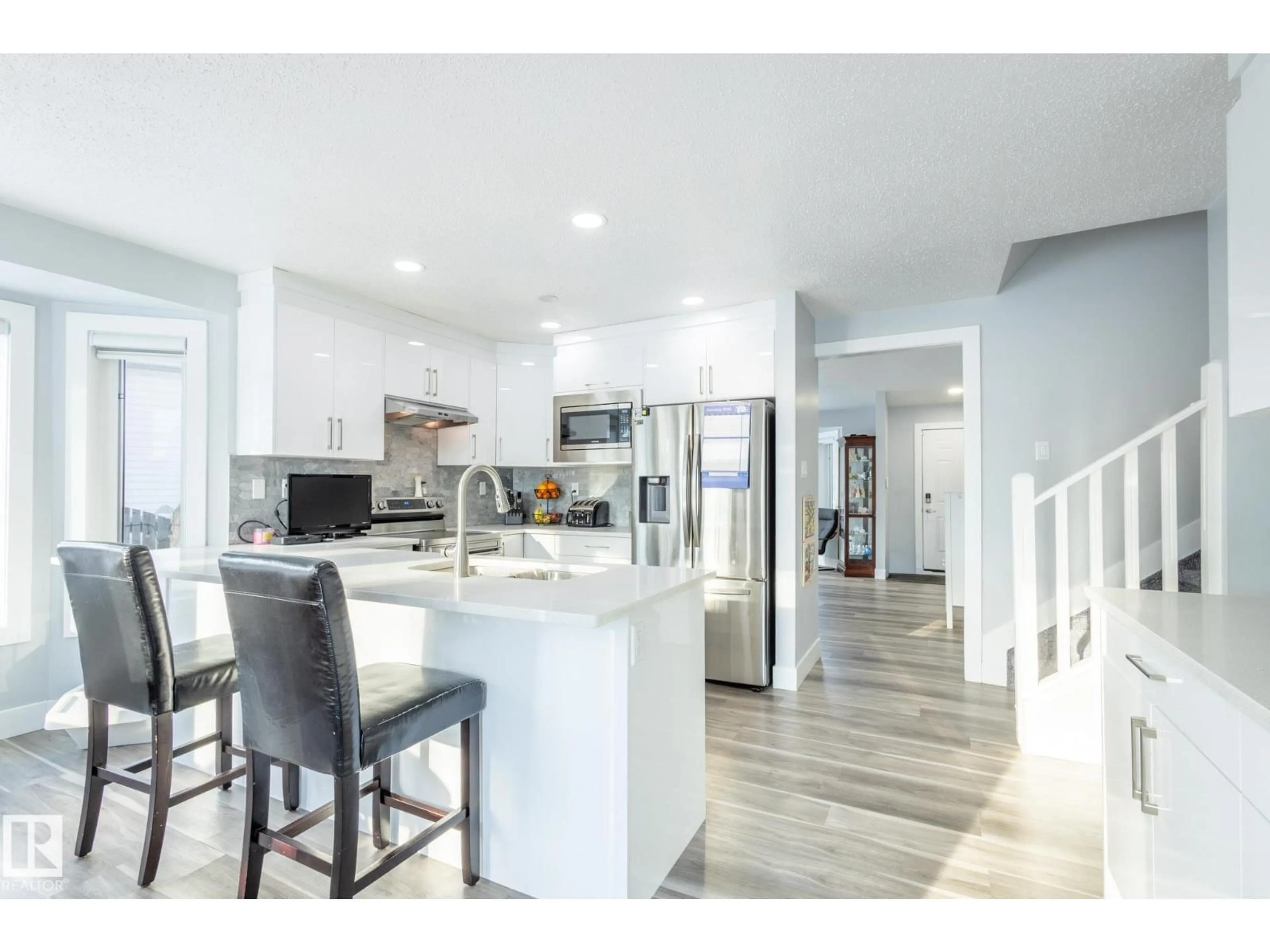 Open concept kitchen, unknown for 8515 24 AV, Edmonton Alberta T6K2W3
