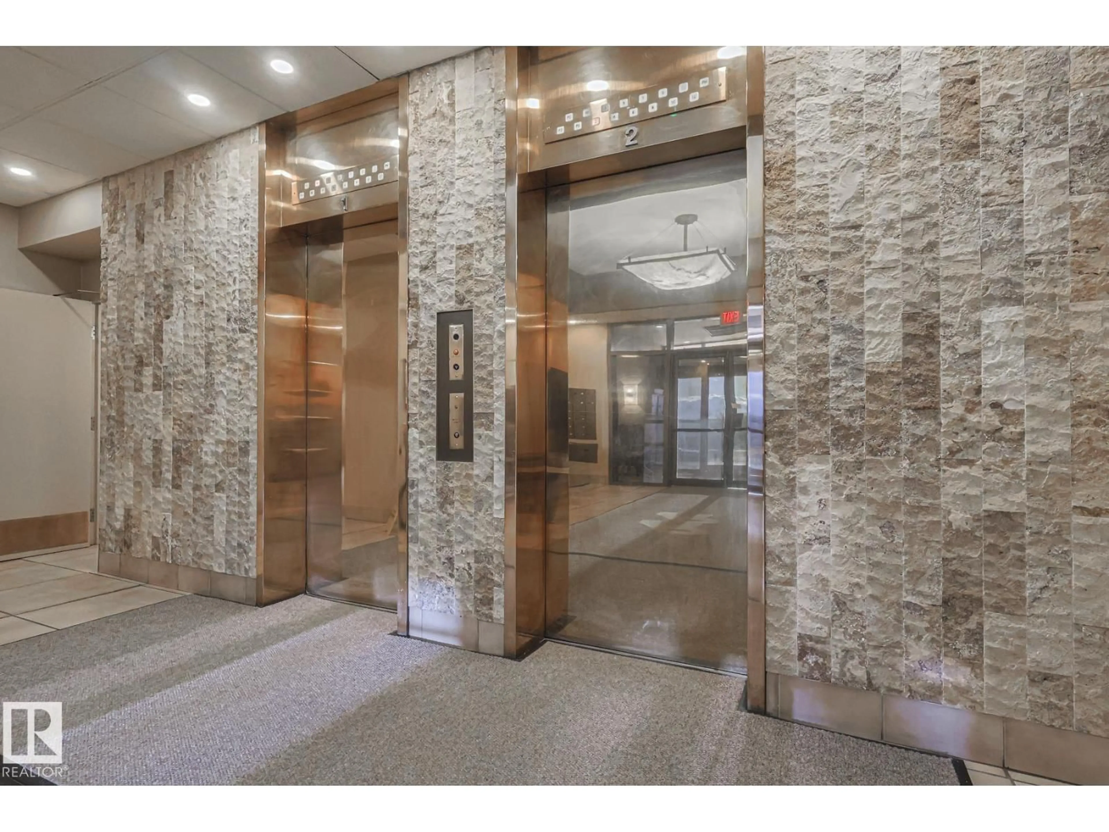 Indoor foyer for #302 - 8340 JASPER AV, Edmonton Alberta T5H4C6