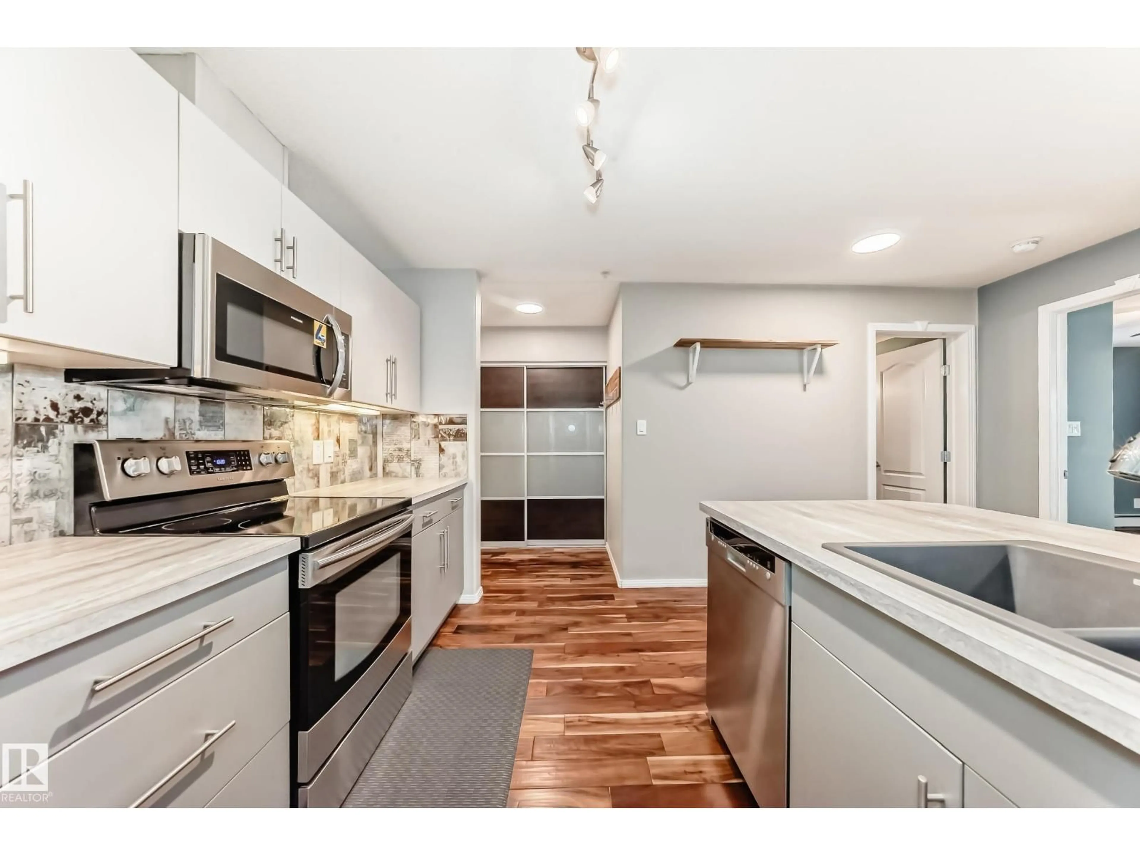 Open concept kitchen, unknown for 592 - 230 HOOKE RD, Edmonton Alberta T5A5H2