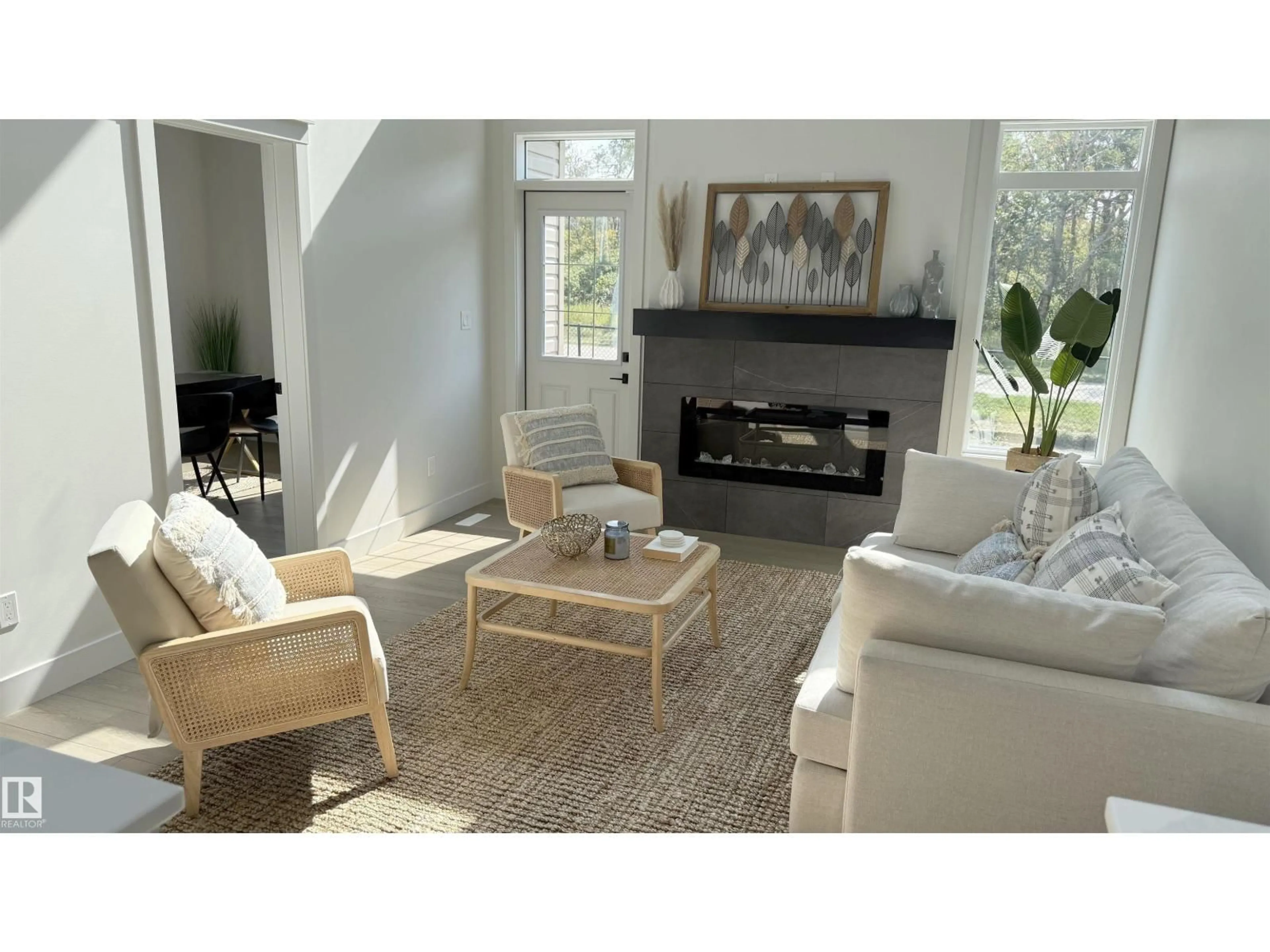 Living room with furniture, unknown for NW - 6235 175 AV, Edmonton Alberta T5Y0K8