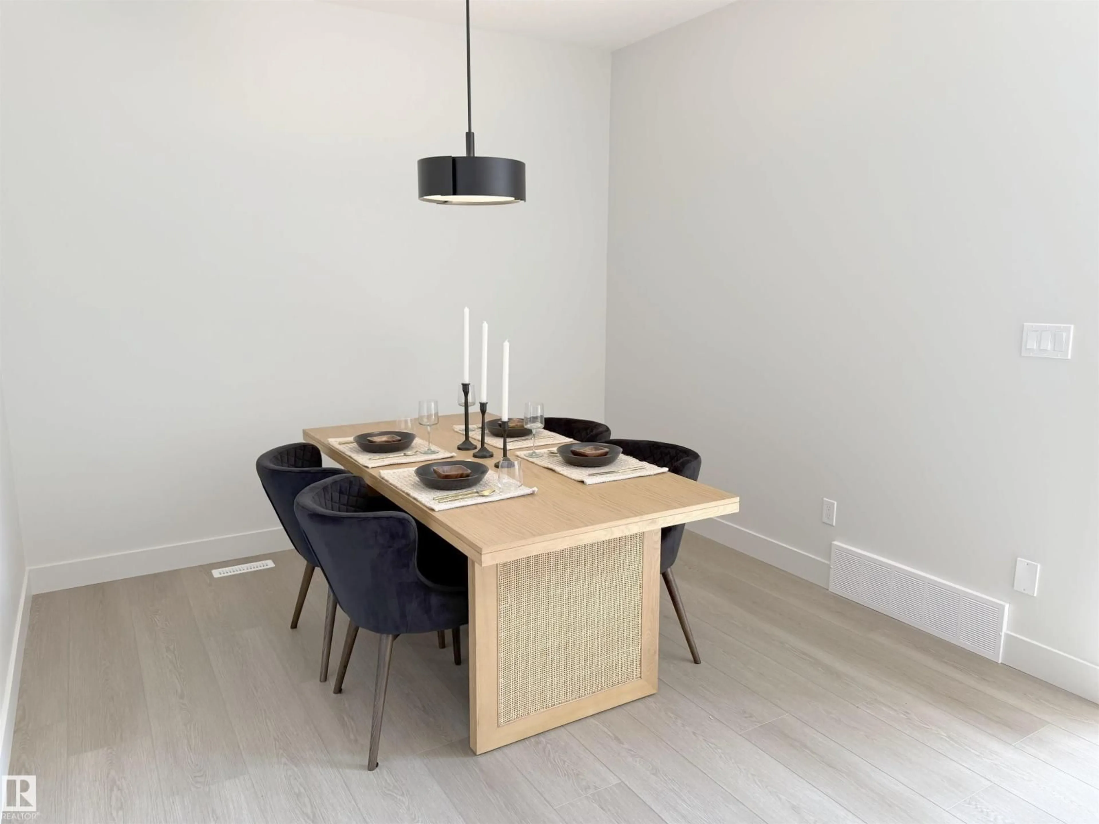 Dining room, wood/laminate floor for NW - 6235 175 AV, Edmonton Alberta T5Y0K8