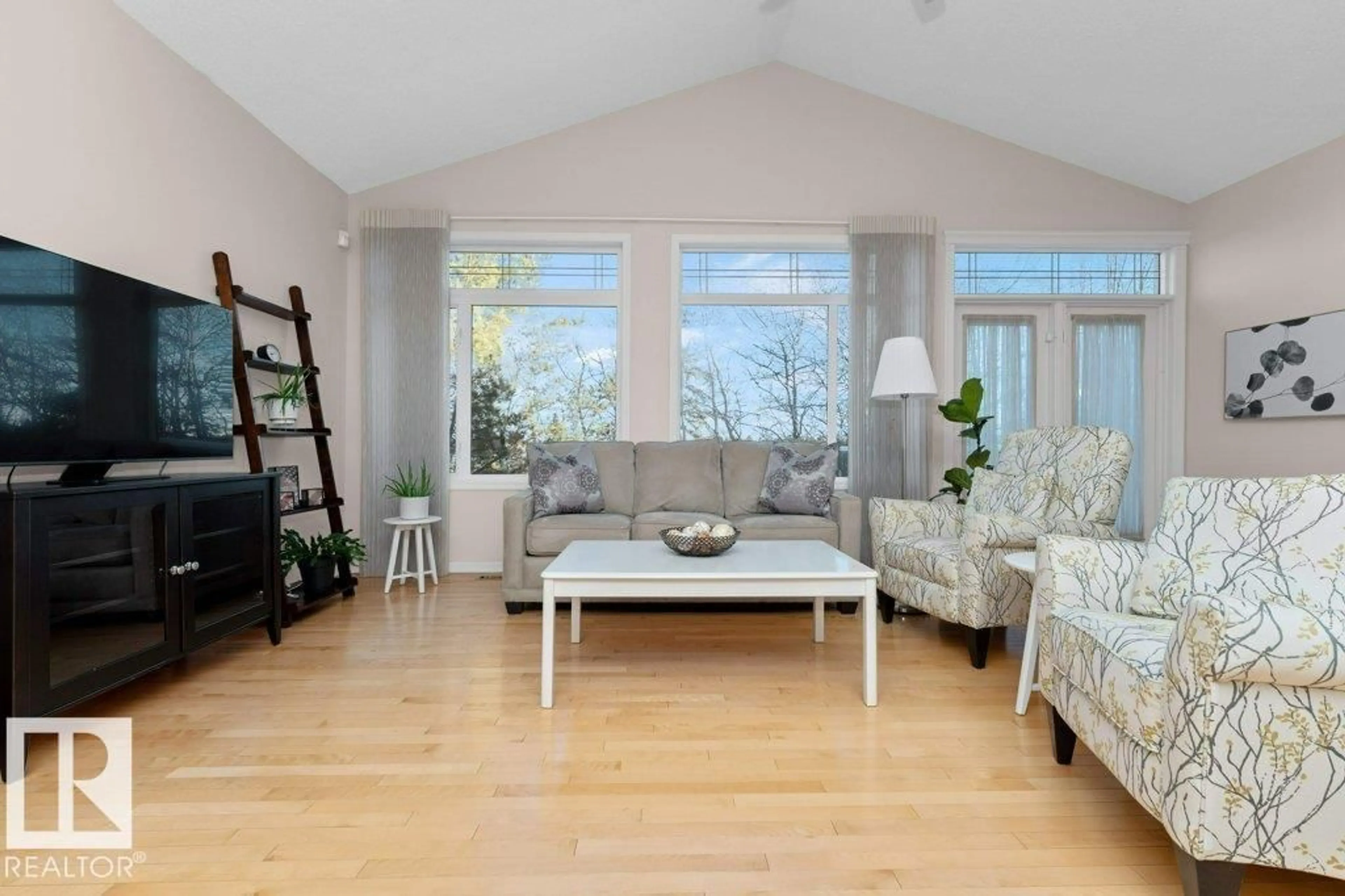 Living room with furniture, wood/laminate floor for 17 - 577 BUTTERWORTH WY, Edmonton Alberta T6R2Y2